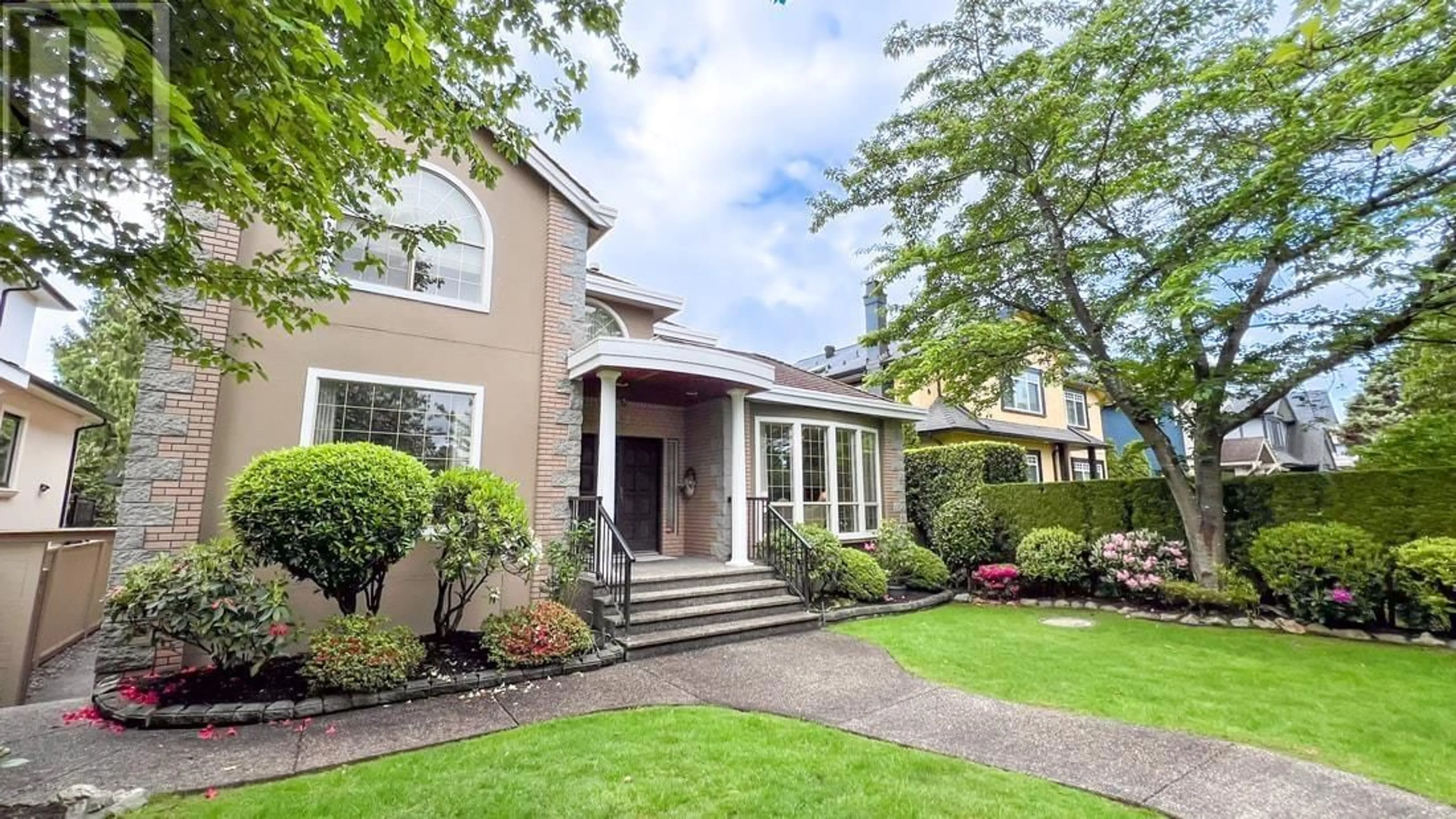 Home with vinyl exterior material, street for 1556 62ND AVENUE, Vancouver British Columbia V6P2E9