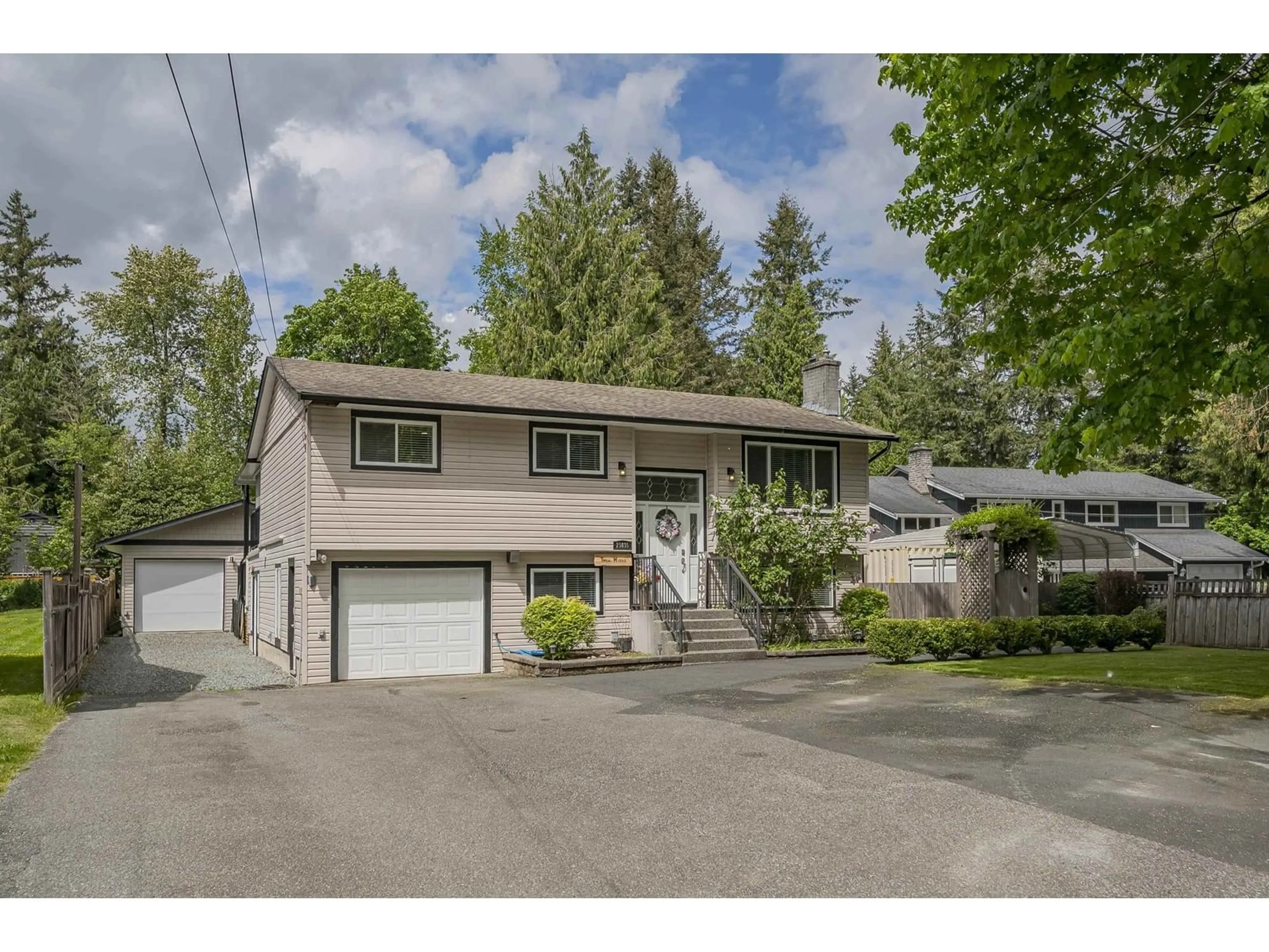 Home with vinyl exterior material, street for 25035 10, Langley British Columbia V4W2S7