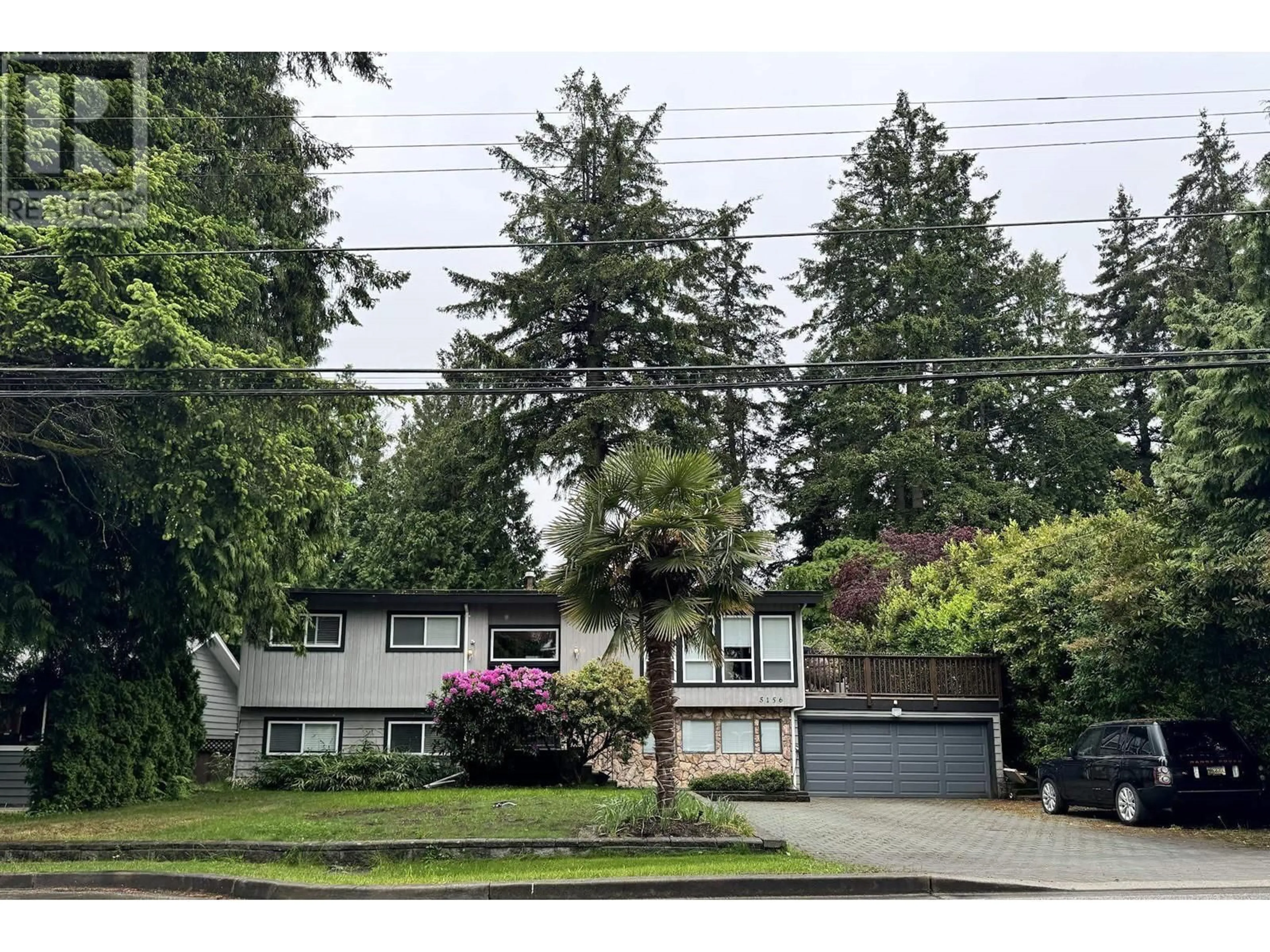 A pic from outside/outdoor area/front of a property/back of a property/a pic from drone, street for 5156 8A AVENUE, Delta British Columbia V4M1T6