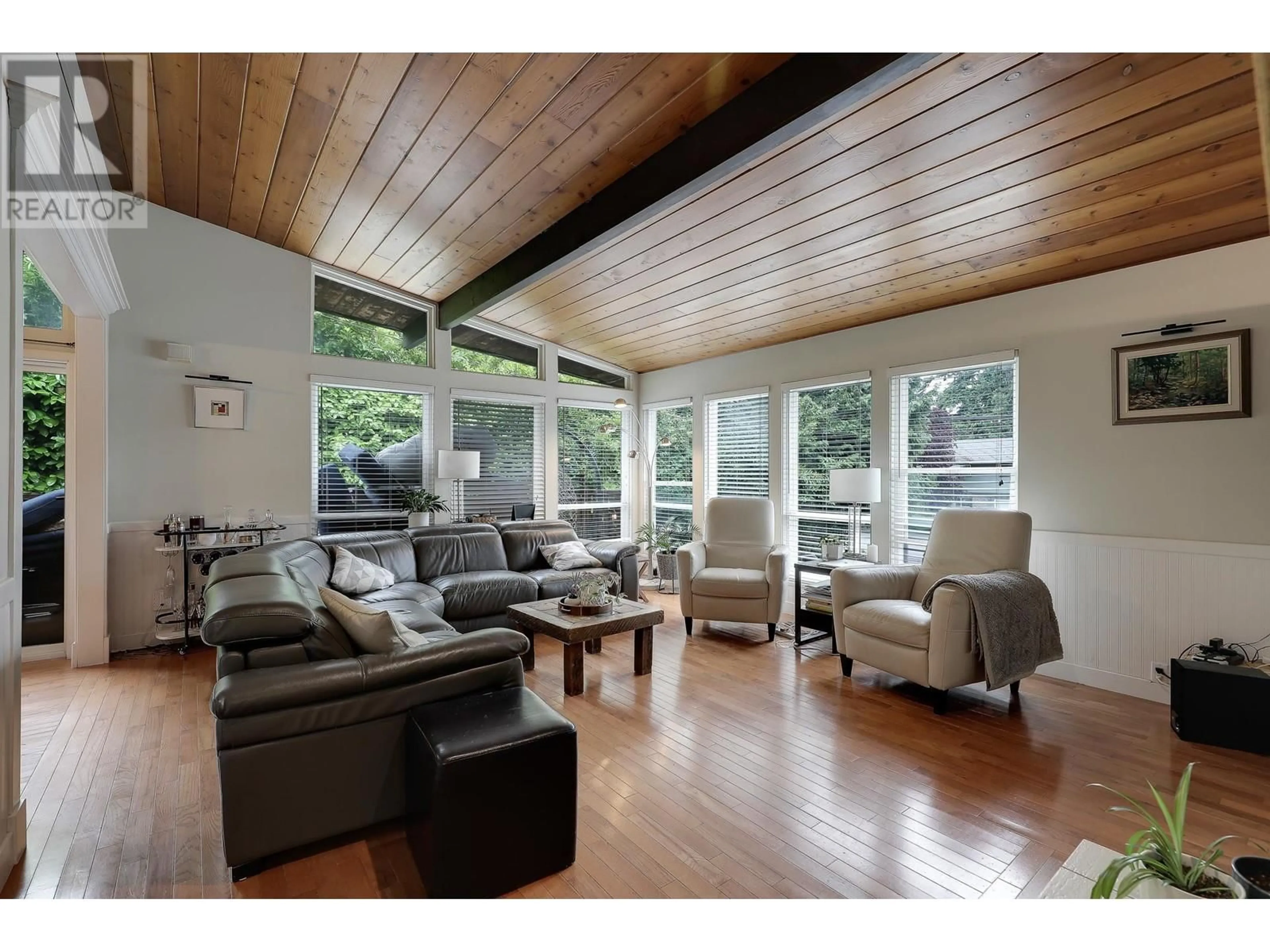 Living room with furniture, wood/laminate floor for 5156 8A AVENUE, Delta British Columbia V4M1T6