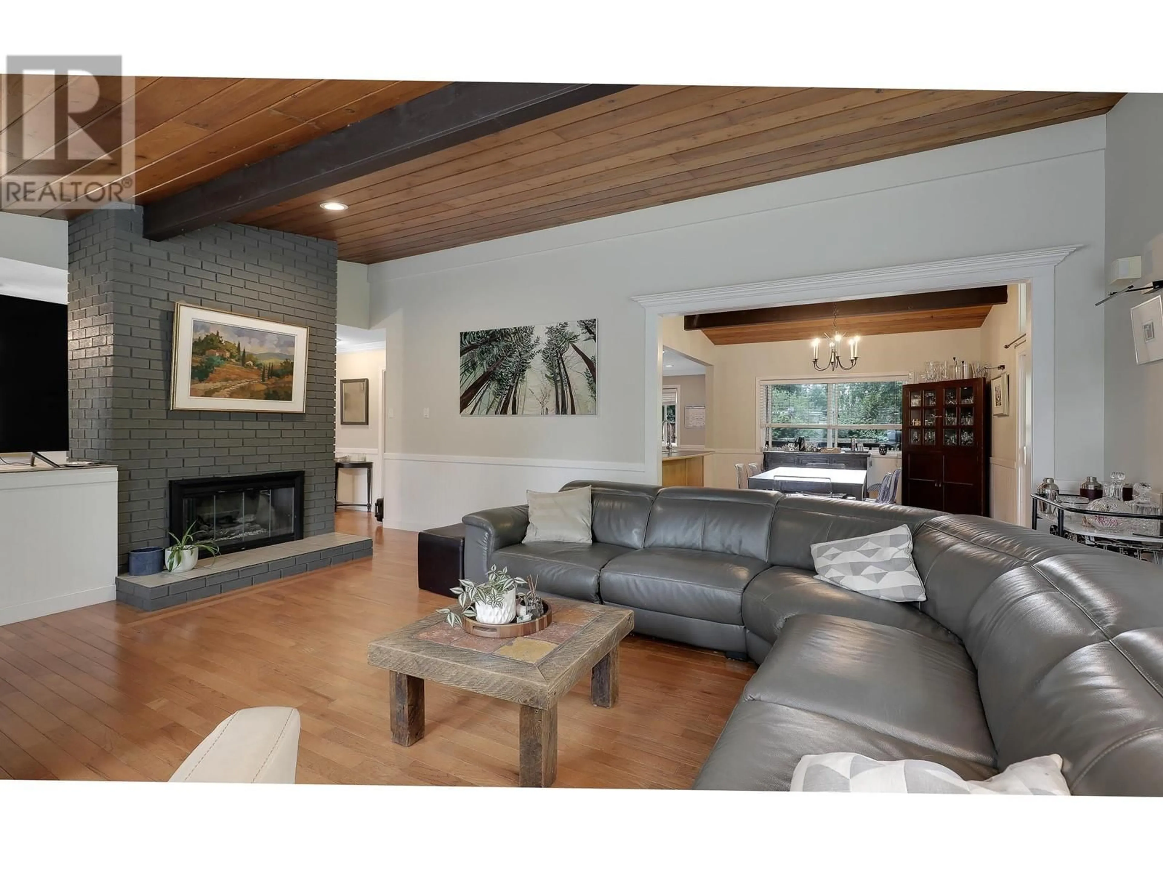 Living room with furniture, wood/laminate floor for 5156 8A AVENUE, Delta British Columbia V4M1T6