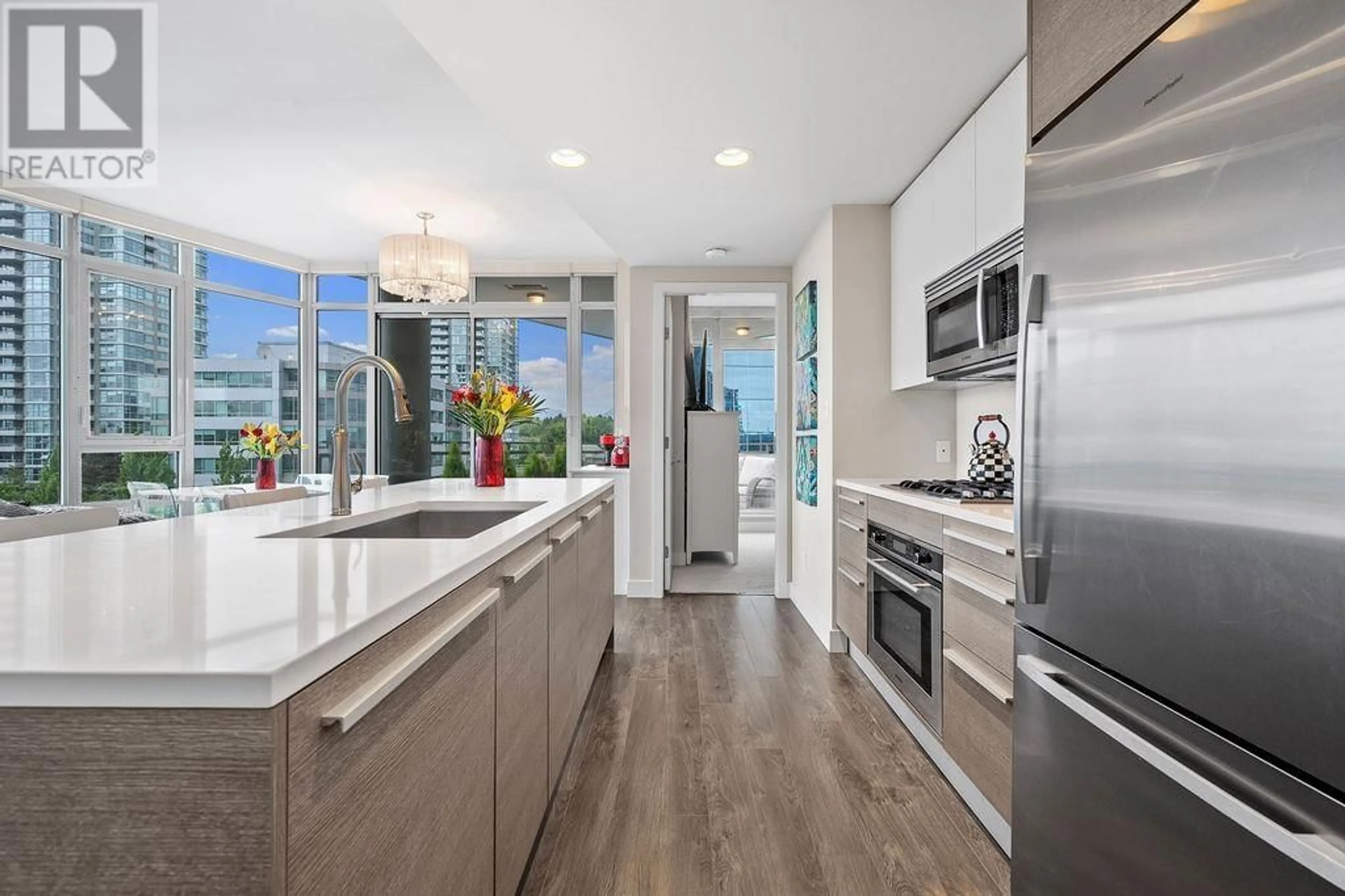 Open concept kitchen, ceramic/tile floor for 702 - 2008 ROSSER AVENUE, Burnaby British Columbia V5C0H8