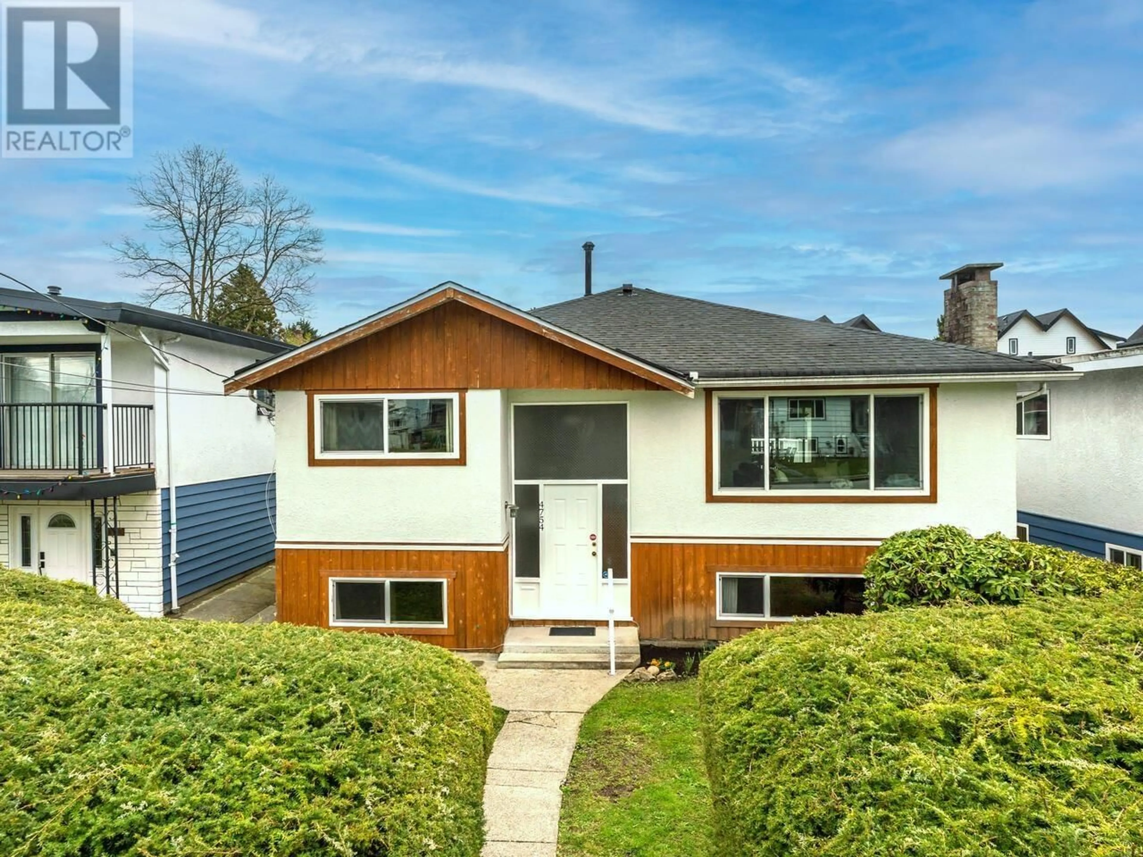 Home with vinyl exterior material, street for 4754 EARLES STREET, Vancouver British Columbia V5R3R2