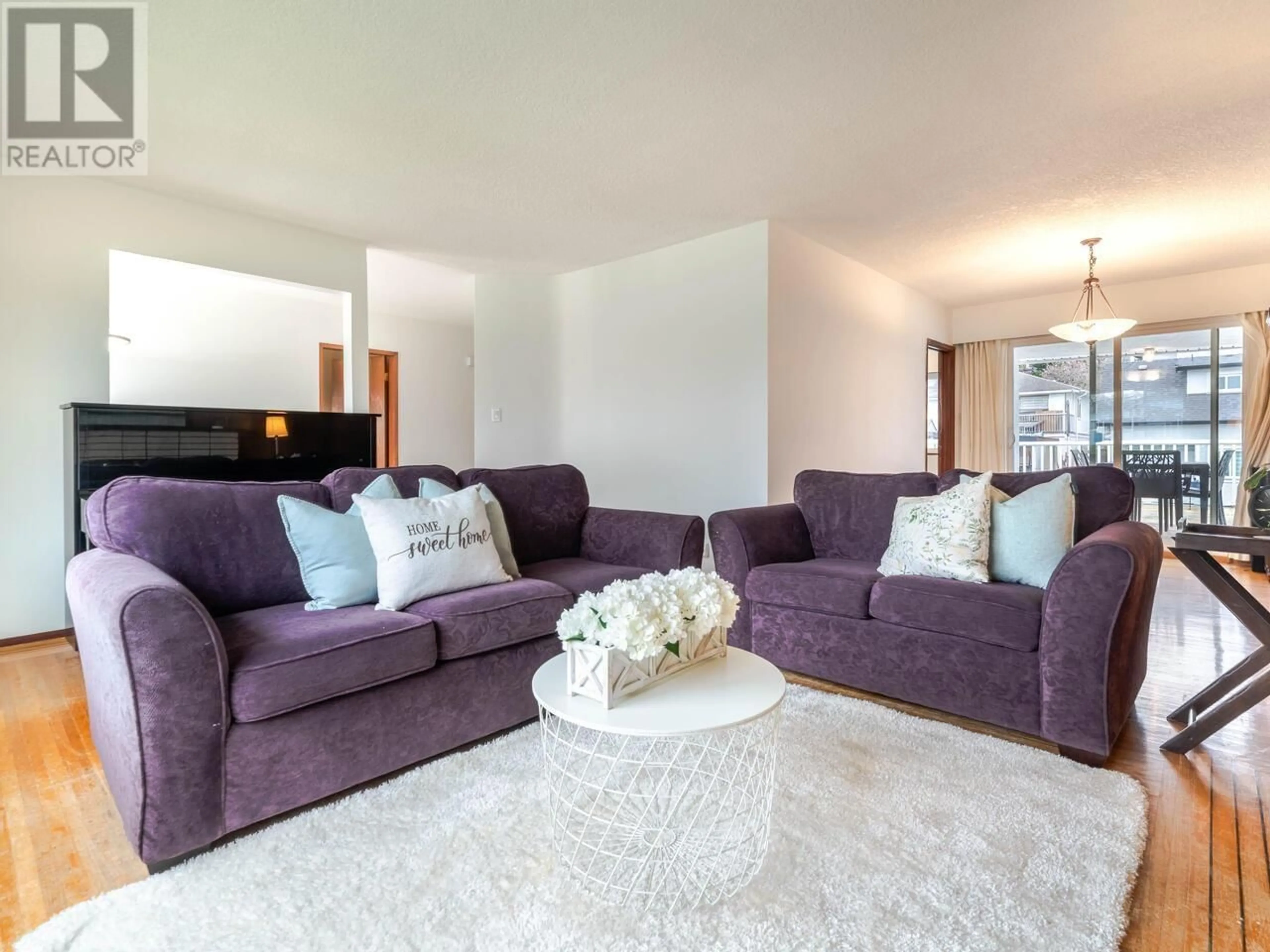 Living room with furniture, carpet floor for 4754 EARLES STREET, Vancouver British Columbia V5R3R2