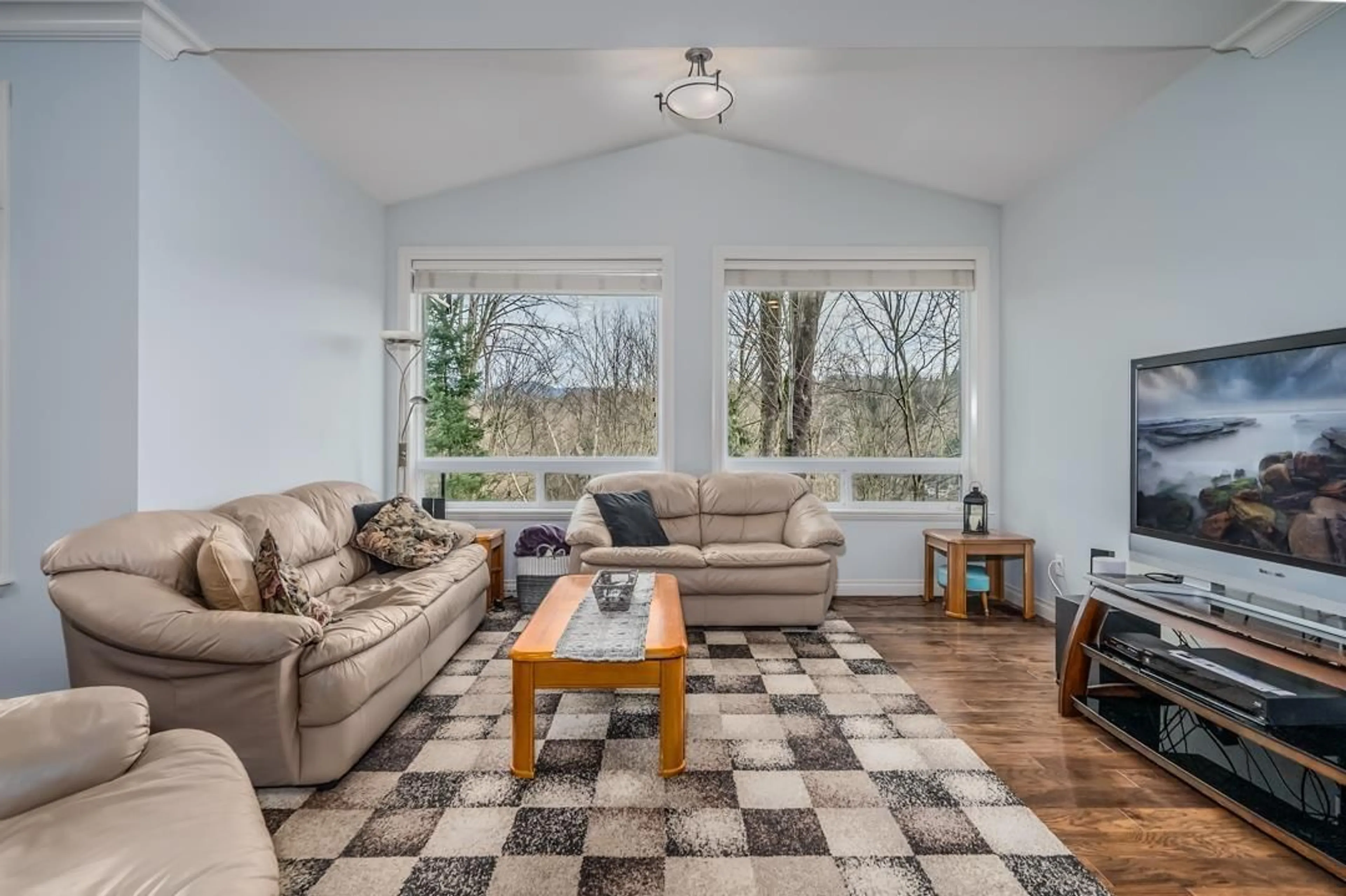Living room with furniture, wood/laminate floor for 3918 CAVES, Abbotsford British Columbia V3G0A1