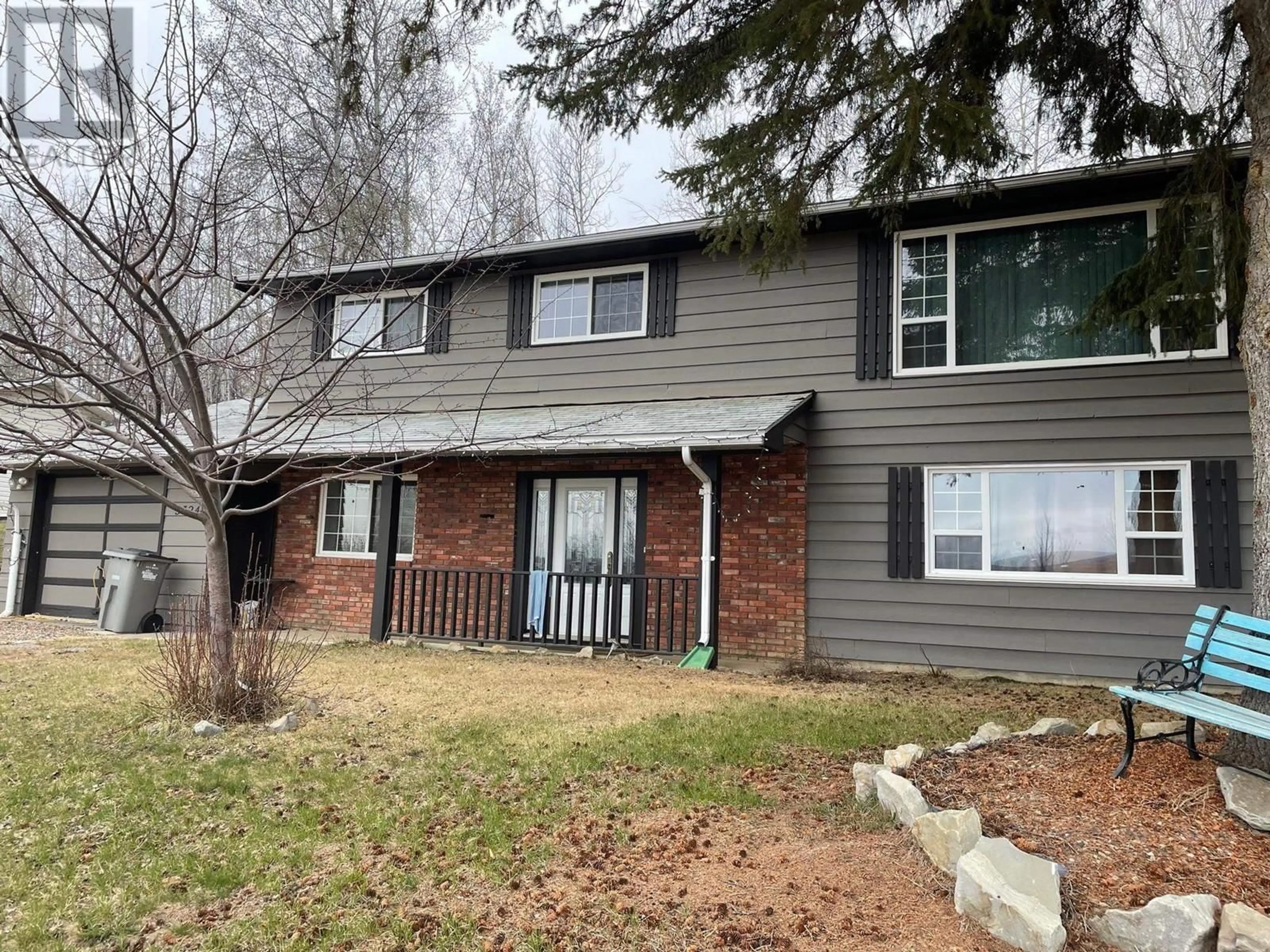 Home with vinyl exterior material, street for 5324 53 AVENUE, Fort Nelson British Columbia V0C1R0