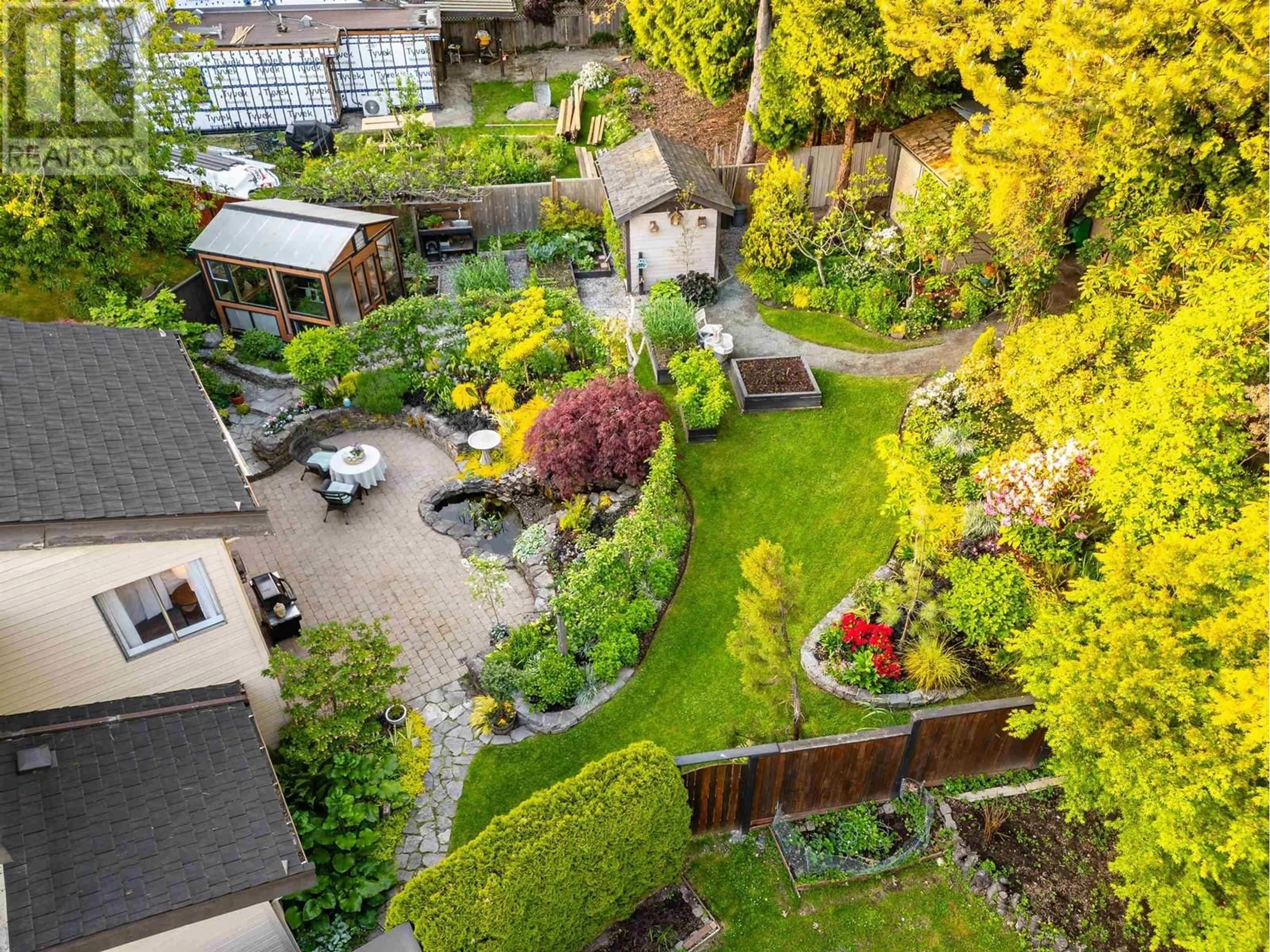 A pic from outside/outdoor area/front of a property/back of a property/a pic from drone, street for 7219 QUATSINO DRIVE, Vancouver British Columbia V5S4C2