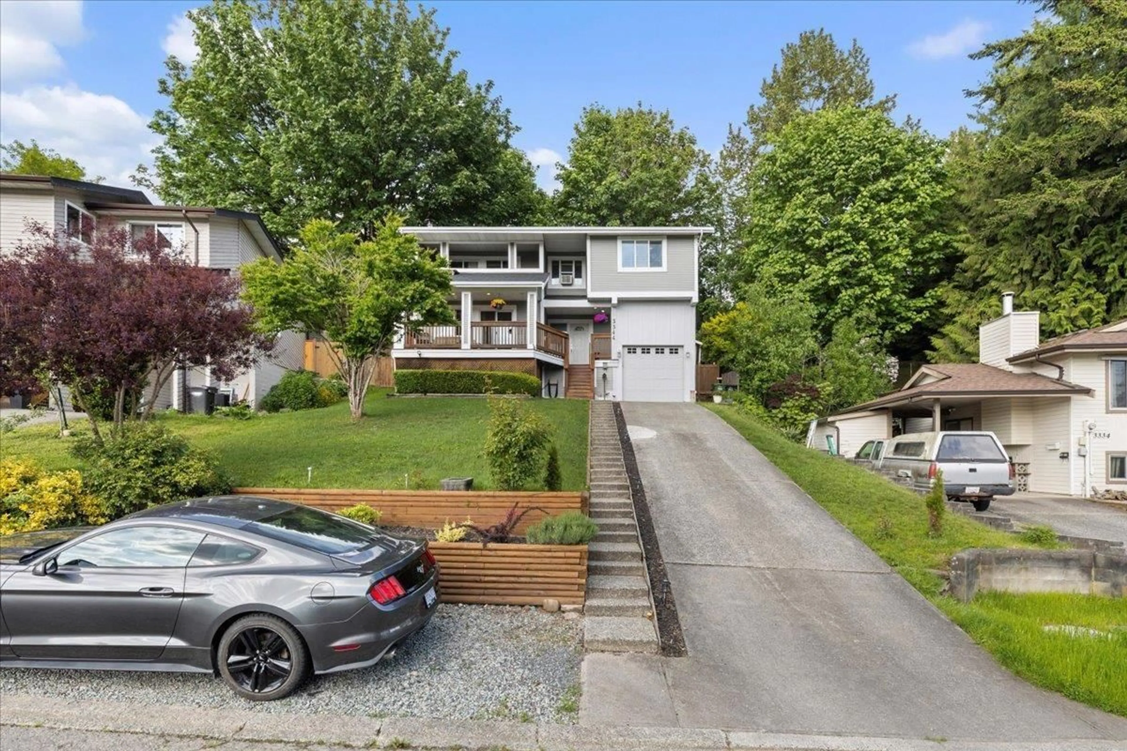 A pic from outside/outdoor area/front of a property/back of a property/a pic from drone, street for 3344 OMINECA, Abbotsford British Columbia V2S8K9