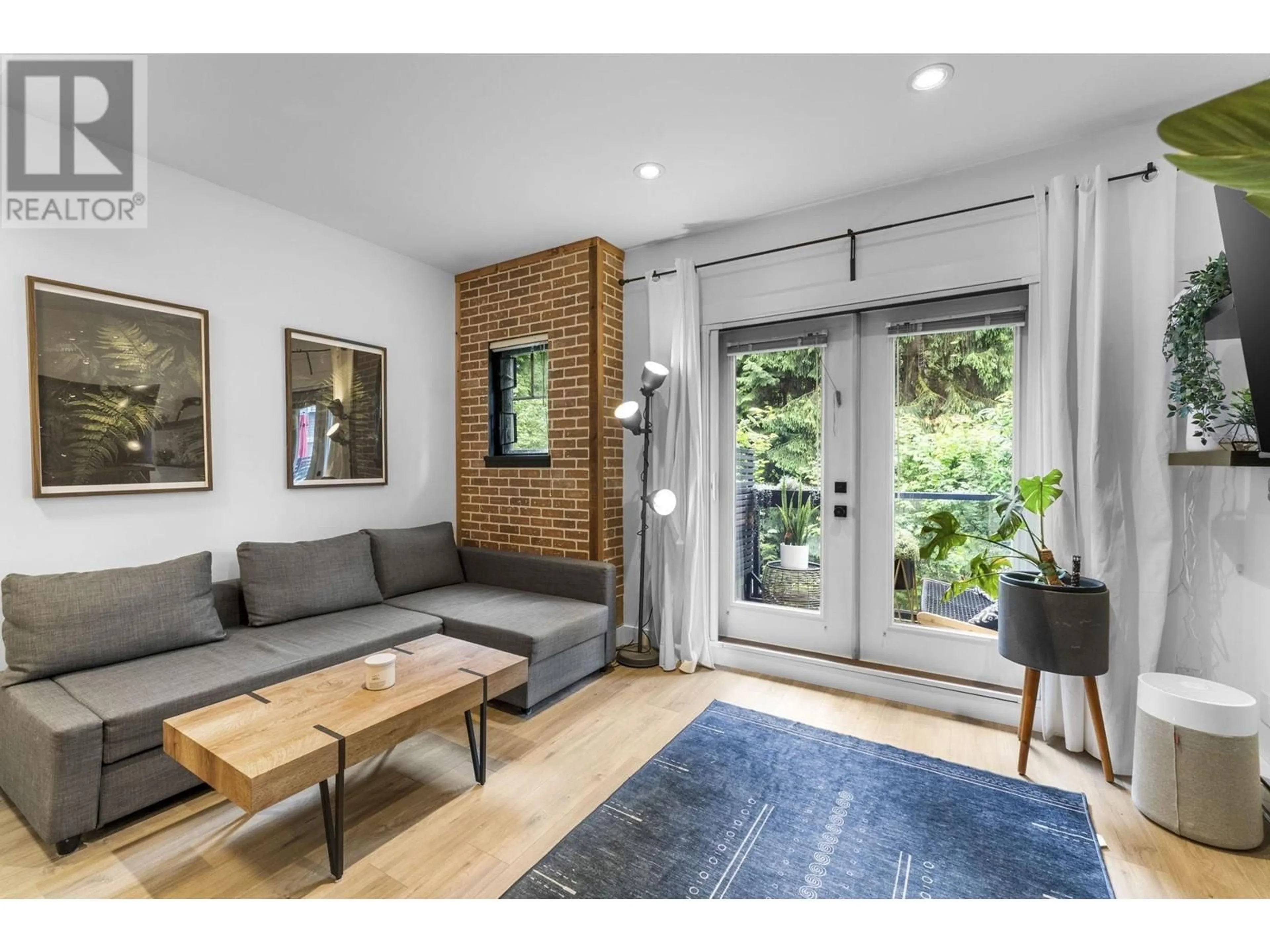 Living room with furniture, unknown for 121 - 3382 VIEWMOUNT DRIVE, Port Moody British Columbia V3H2M1