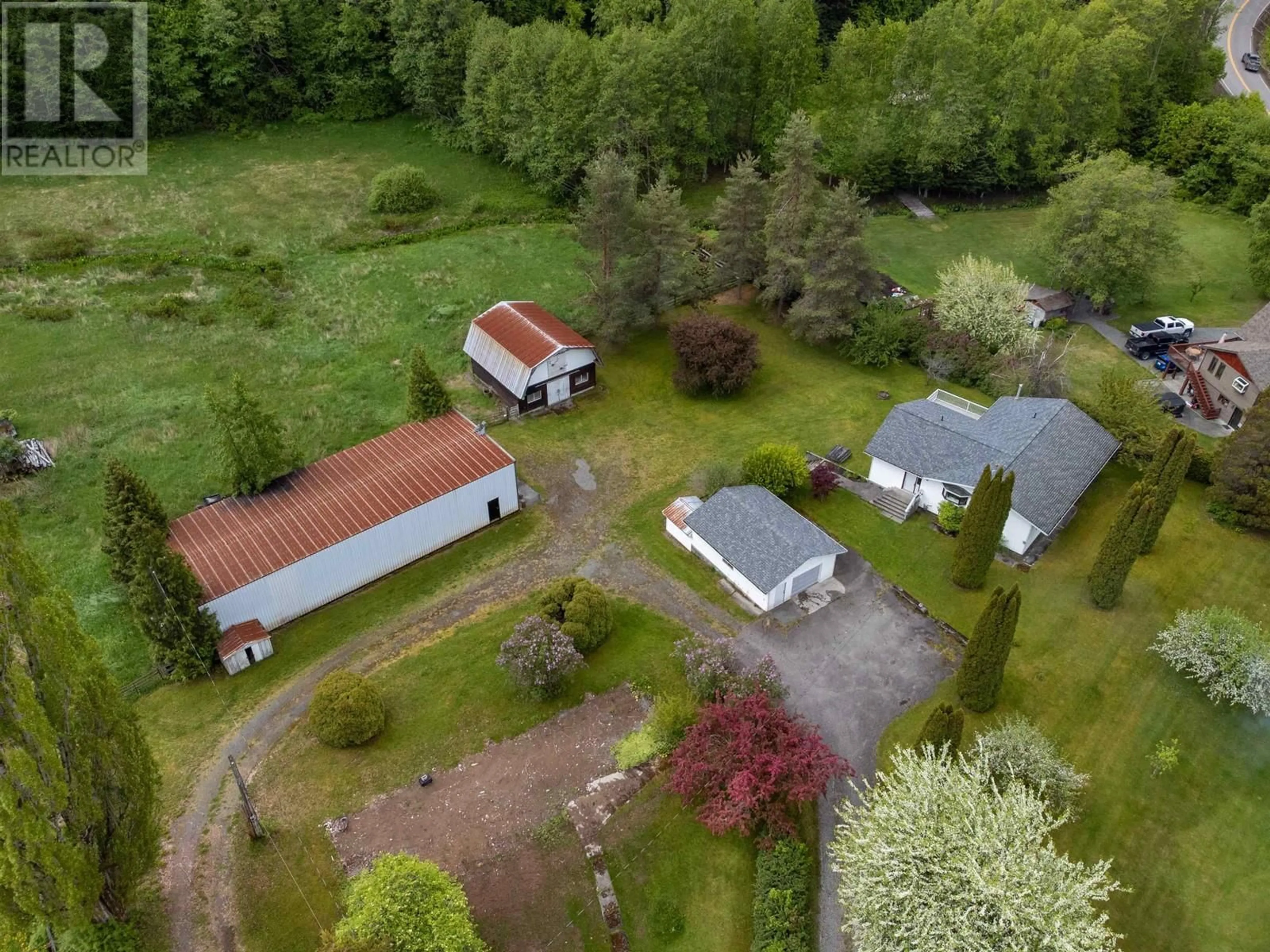 A pic from outside/outdoor area/front of a property/back of a property/a pic from drone, street for 4670 LOWRIE AVENUE, Terrace British Columbia V8G3Z1