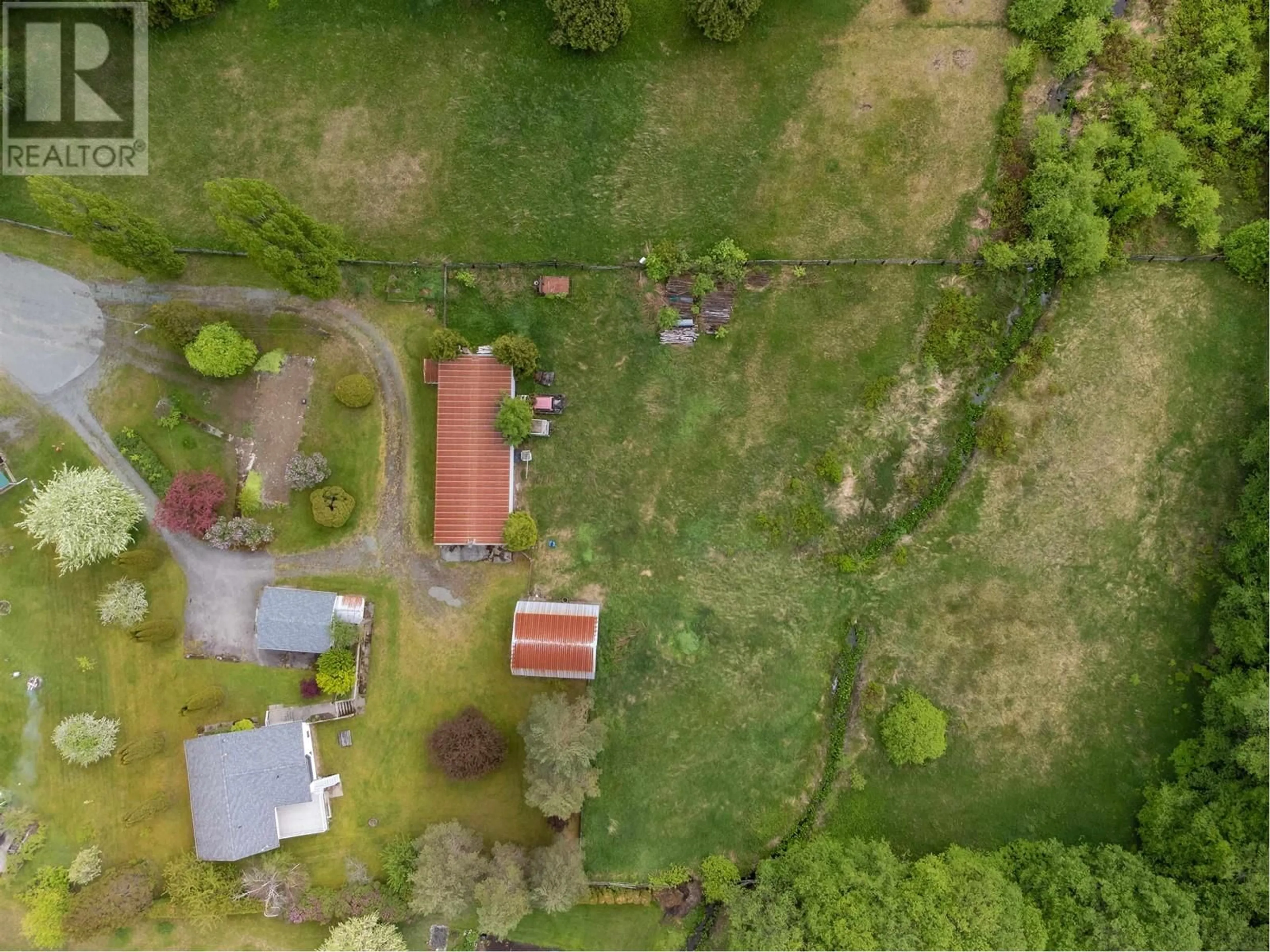 A pic from outside/outdoor area/front of a property/back of a property/a pic from drone, street for 4670 LOWRIE AVENUE, Terrace British Columbia V8G3Z1
