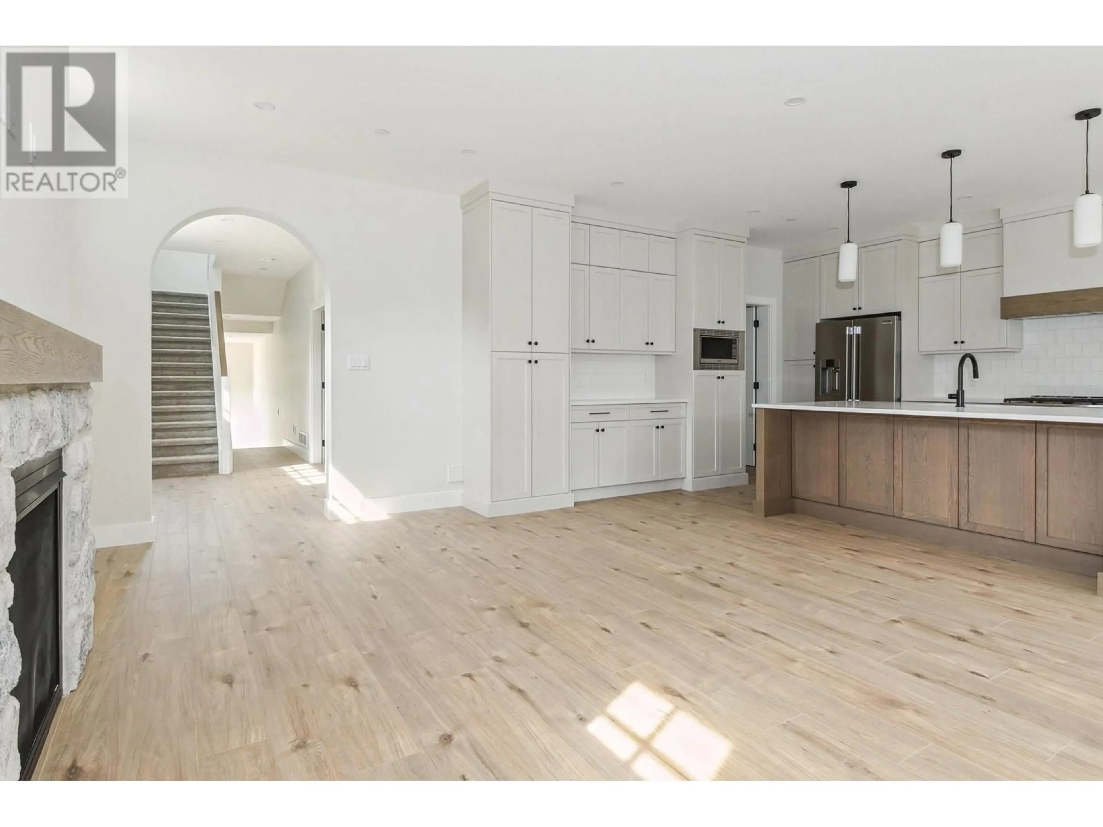 Open concept kitchen, wood/laminate floor for 19570 HAMMOND ROAD, Pitt Meadows British Columbia V3Y1L5
