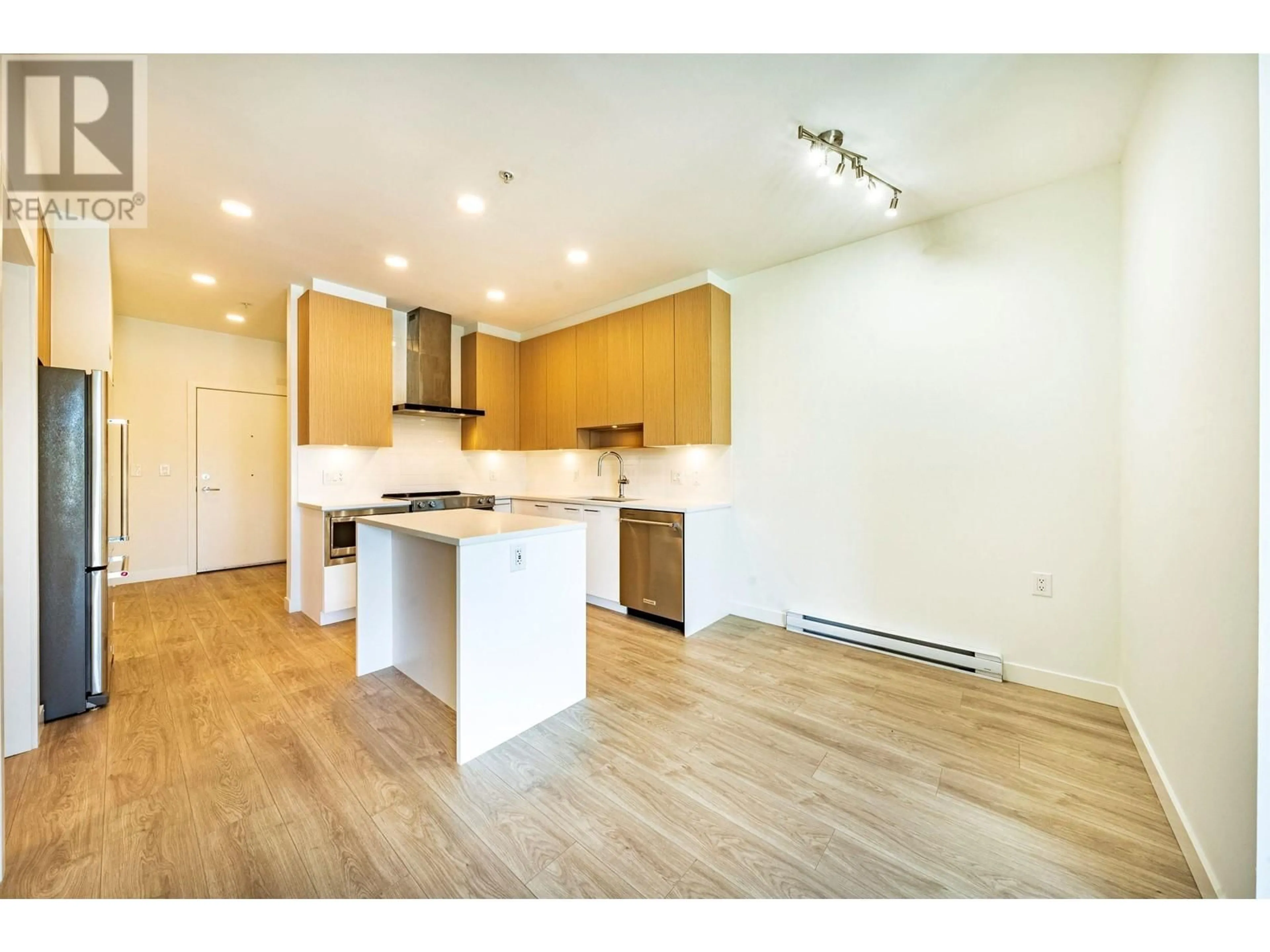 Open concept kitchen, wood/laminate floor for 406 - 7599 15TH STREET, Burnaby British Columbia V3N0H9