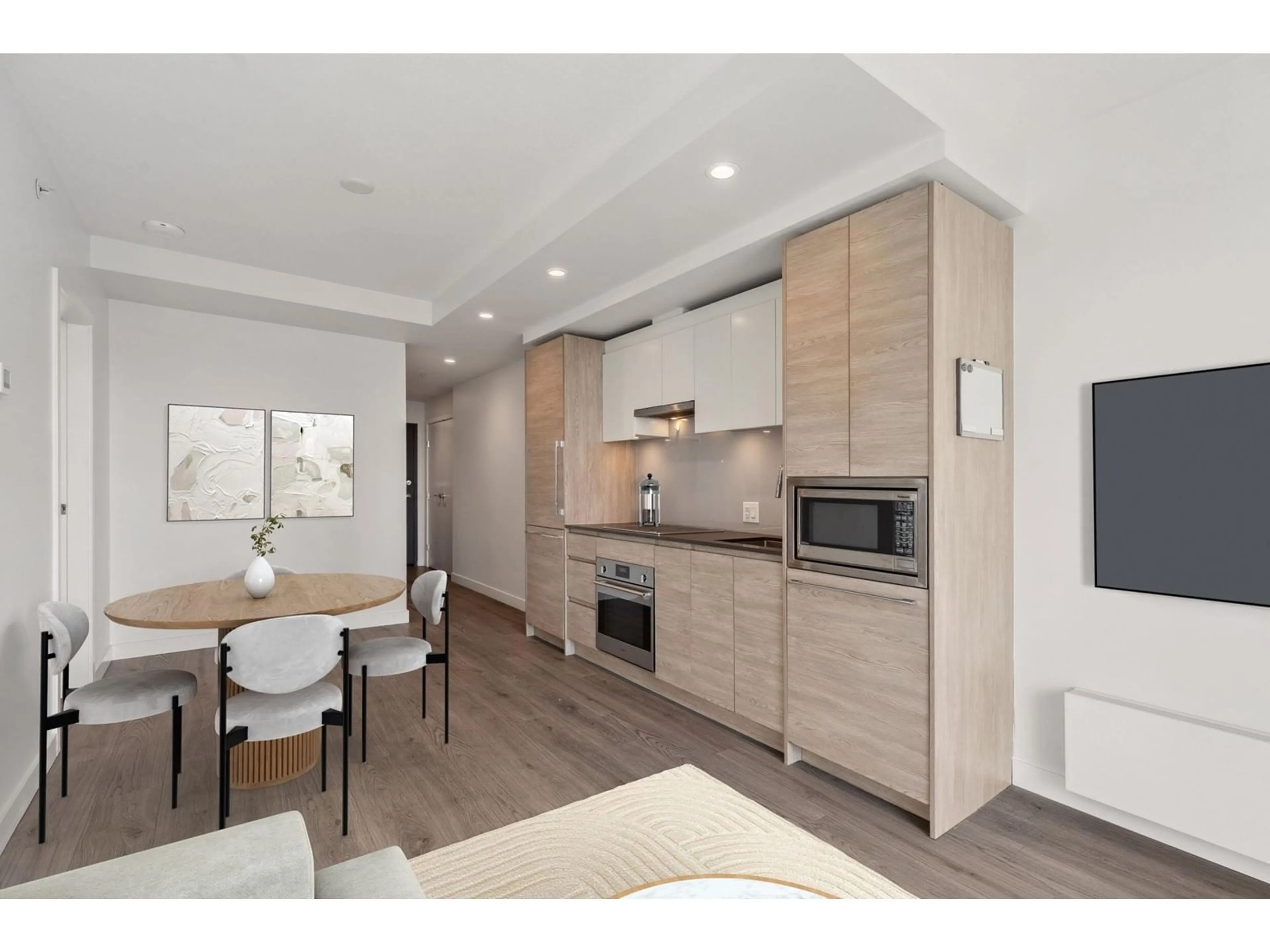 Open concept kitchen, wood/laminate floor for 1112 - 13615 FRASER, Surrey British Columbia V3T0P7