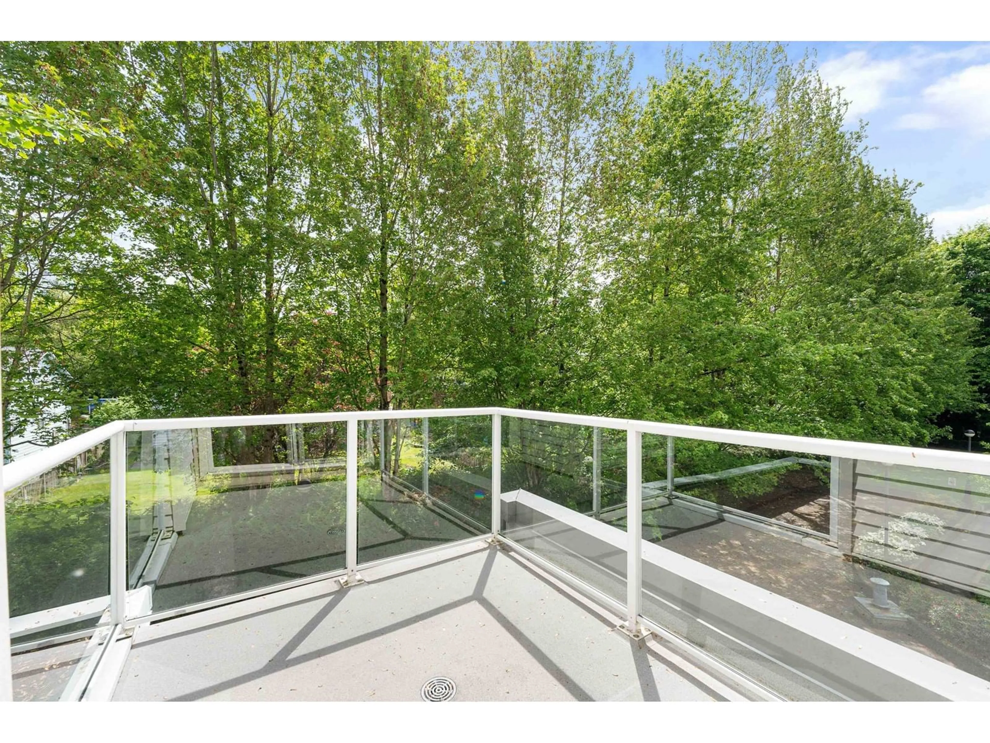 Patio, forest/trees view for D303 - 9838 WHALLEY, Surrey British Columbia V3T5S8