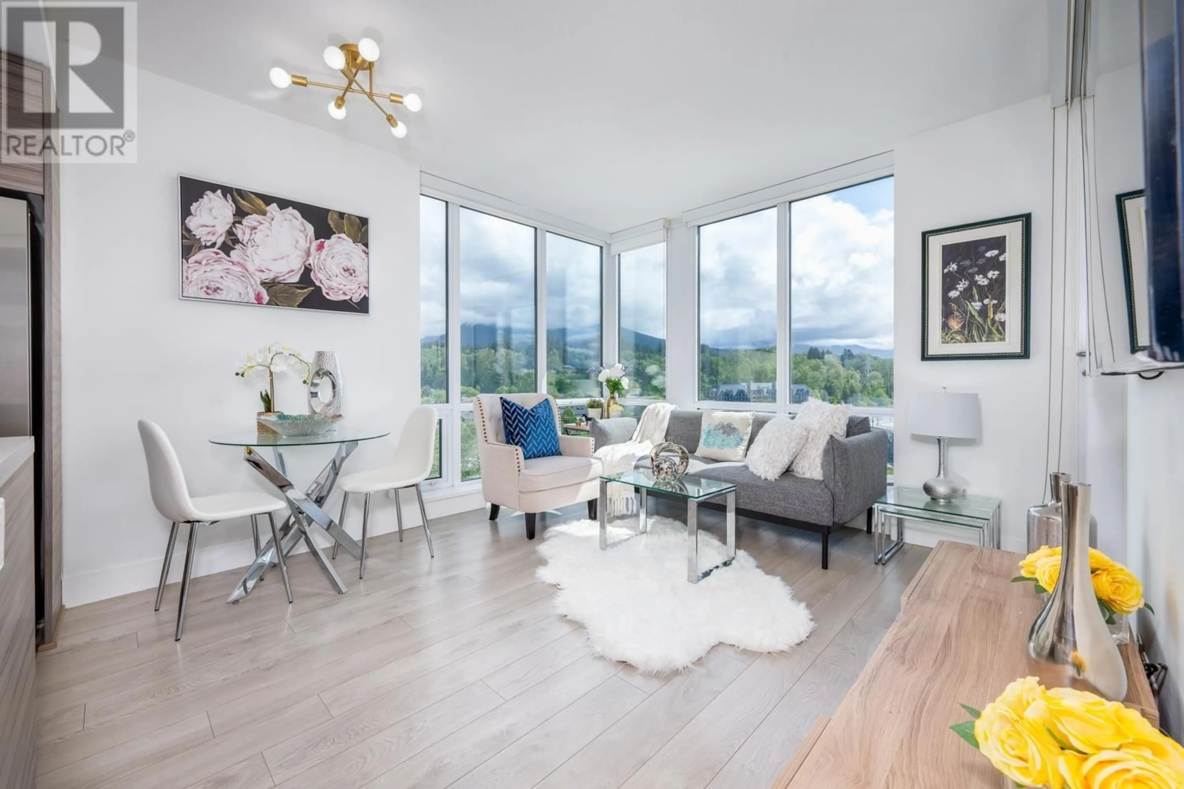 Living room with furniture, wood/laminate floor for 1003 - 1550 FERN STREET, North Vancouver British Columbia V7J0A9