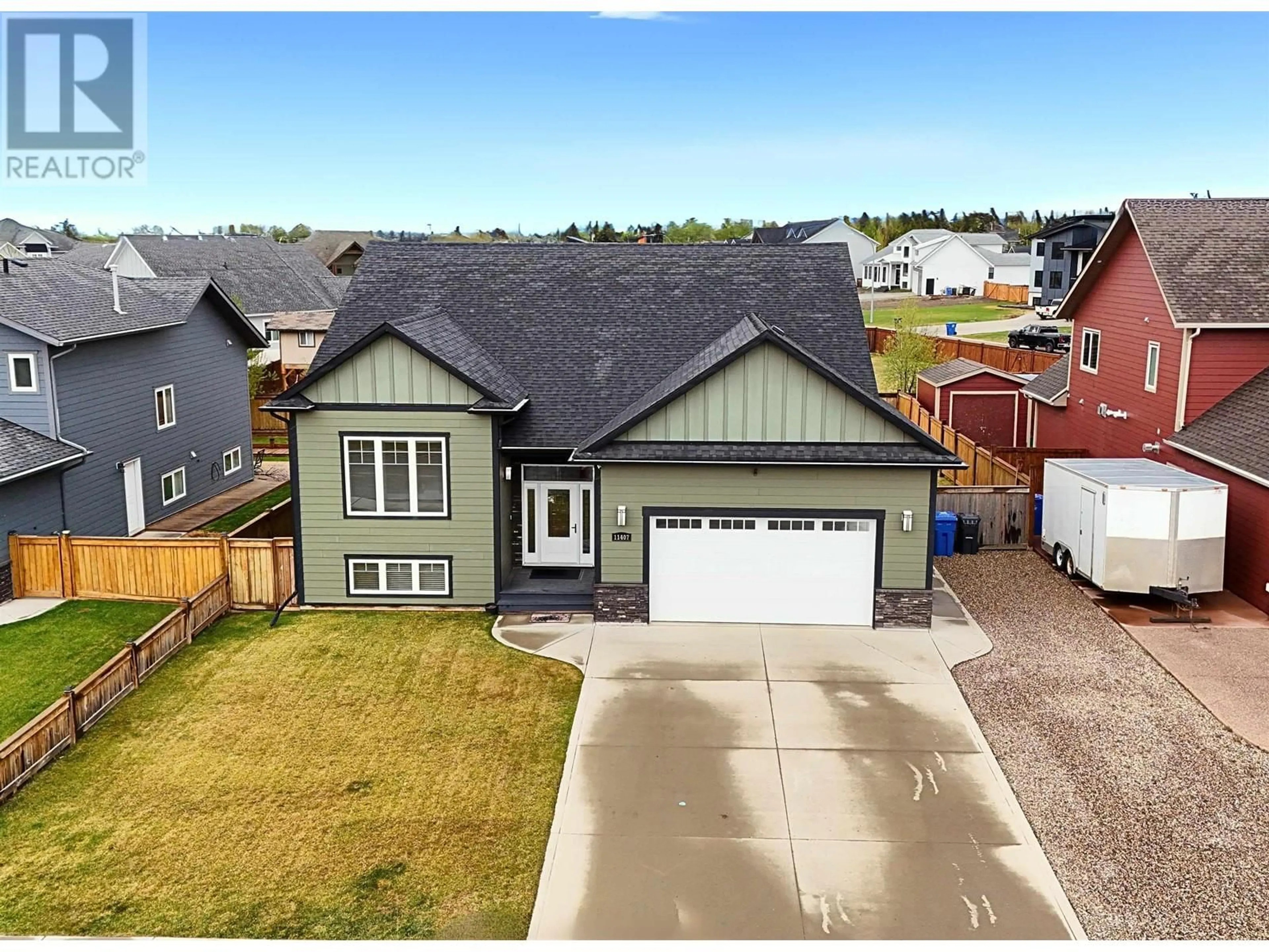 A pic from outside/outdoor area/front of a property/back of a property/a pic from drone, street for 11407 111 STREET, Fort St. John British Columbia V1J0N4