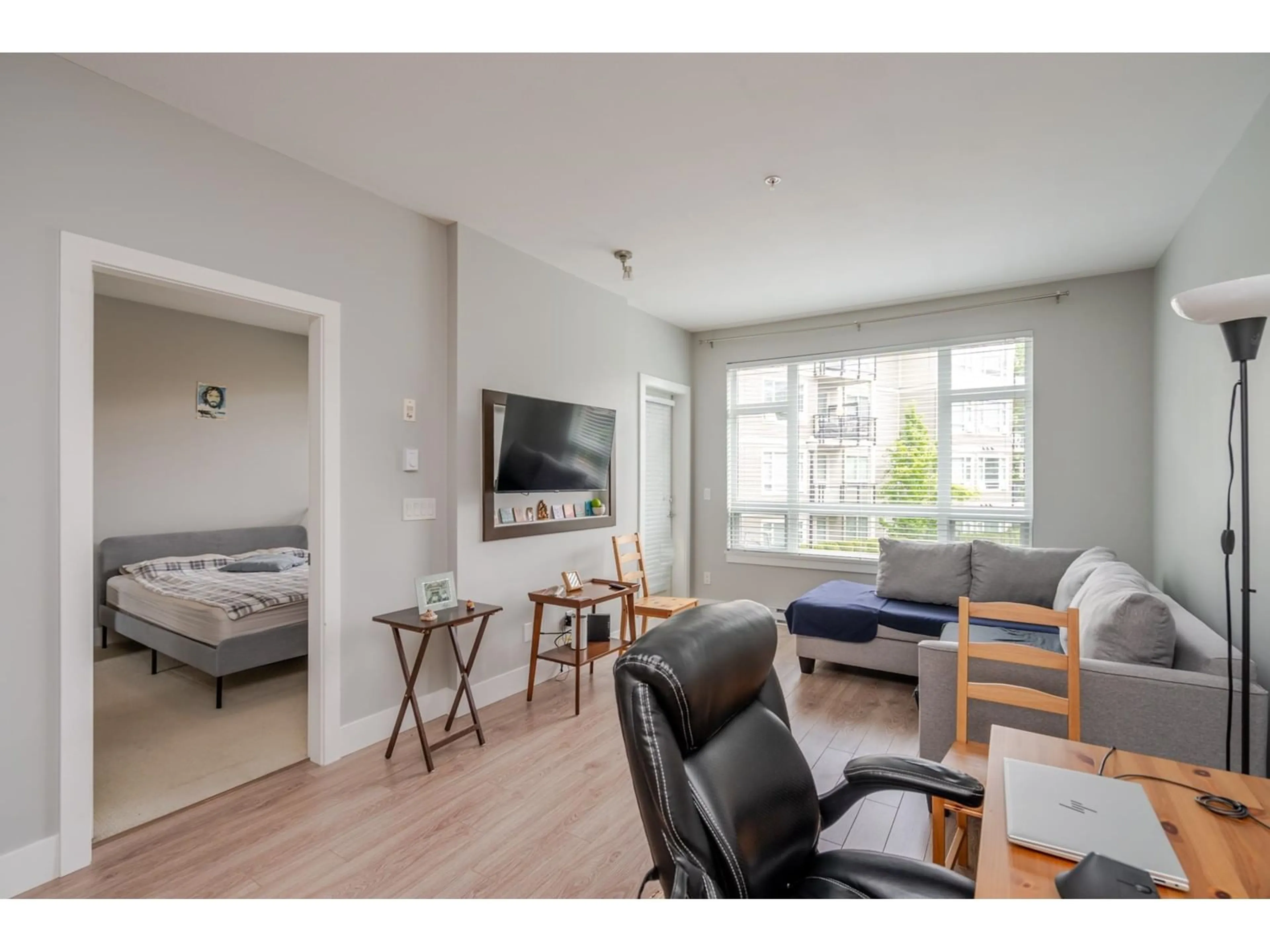 Living room with furniture, wood/laminate floor for C225 - 20211 66, Langley British Columbia V2Y0L4