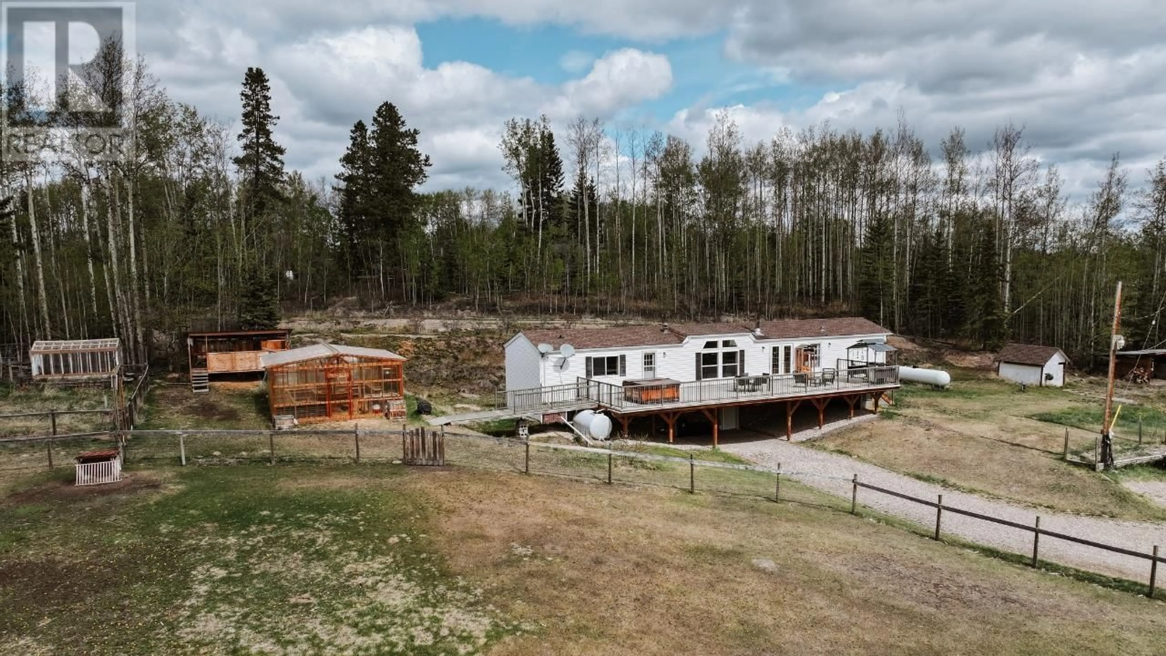 A pic from outside/outdoor area/front of a property/back of a property/a pic from drone, unknown for 15288 MUSEUM ROAD, Buick Creek British Columbia V0C2R0