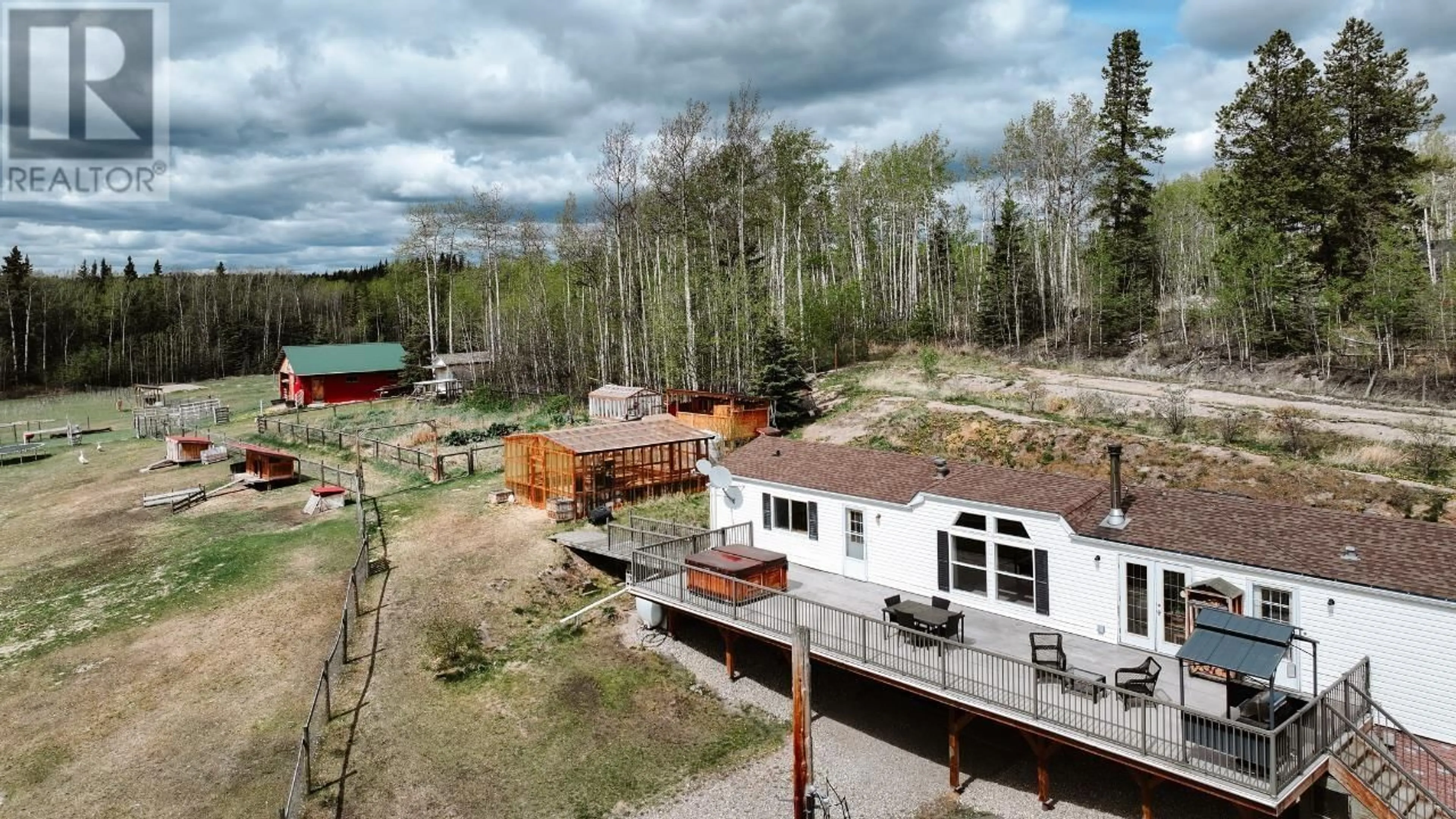 A pic from outside/outdoor area/front of a property/back of a property/a pic from drone, unknown for 15288 MUSEUM ROAD, Buick Creek British Columbia V0C2R0
