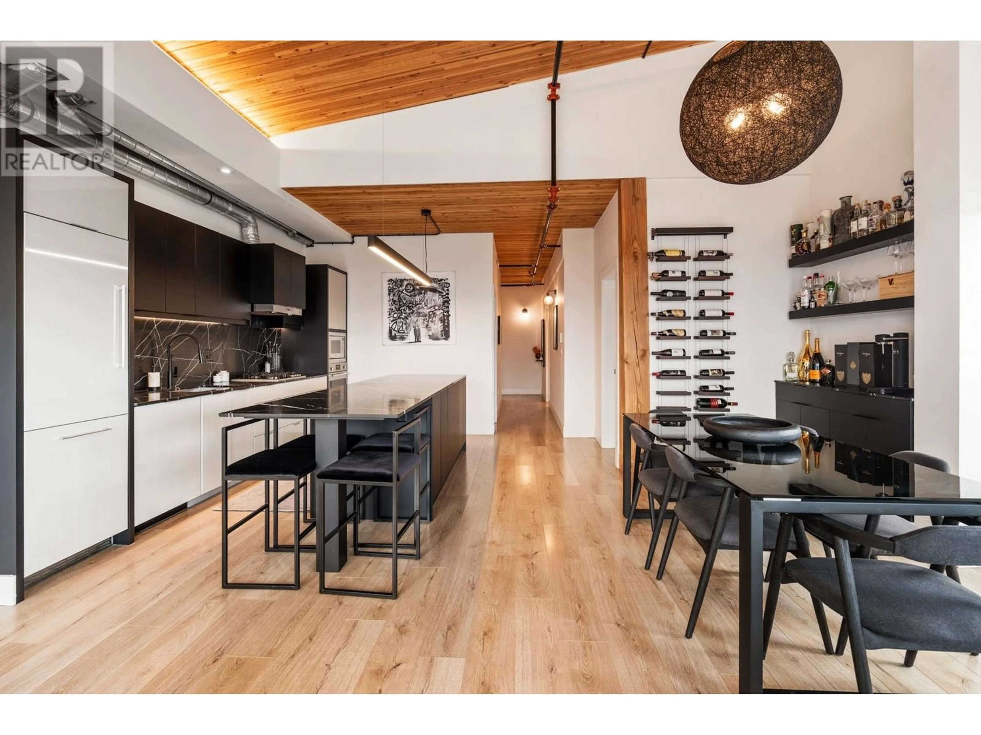 Open concept kitchen, wood/laminate floor for 401 - 4223 HASTINGS STREET, Burnaby British Columbia V5C2J5