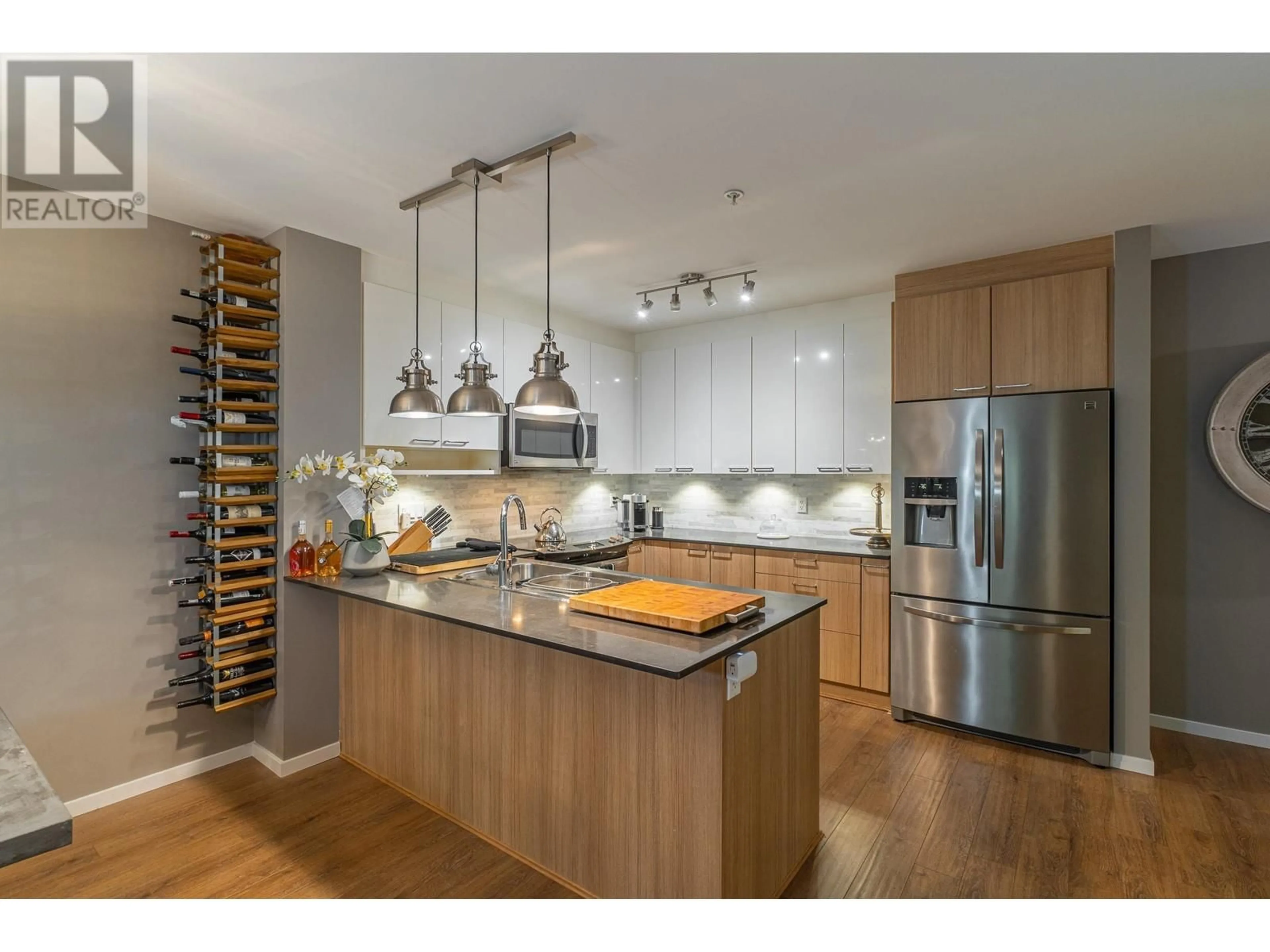 Open concept kitchen, wood/laminate floor for 202 - 210 LEBLEU STREET, Coquitlam British Columbia V3K4L6