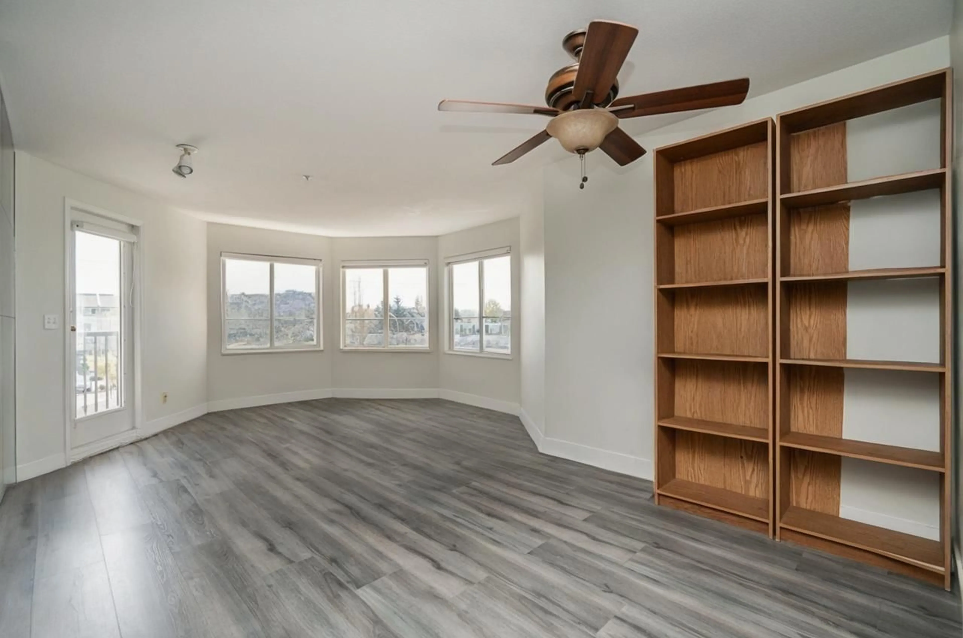 Living room with furniture, wood/laminate floor for 305 - 5765 GLOVER, Langley British Columbia V3A8M8
