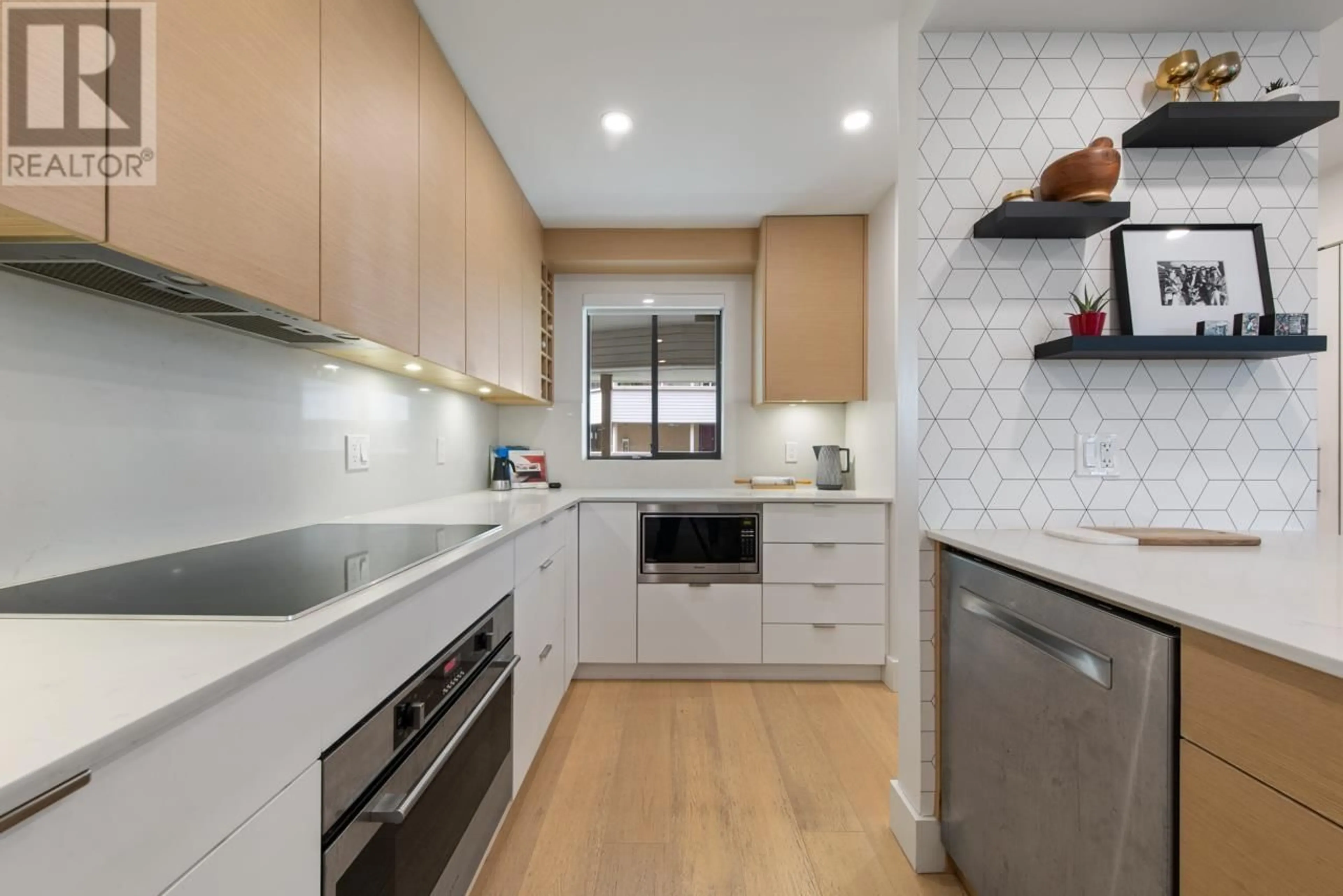 Contemporary kitchen, ceramic/tile floor for 301 - 1350 COMOX STREET, Vancouver British Columbia V6E4E1