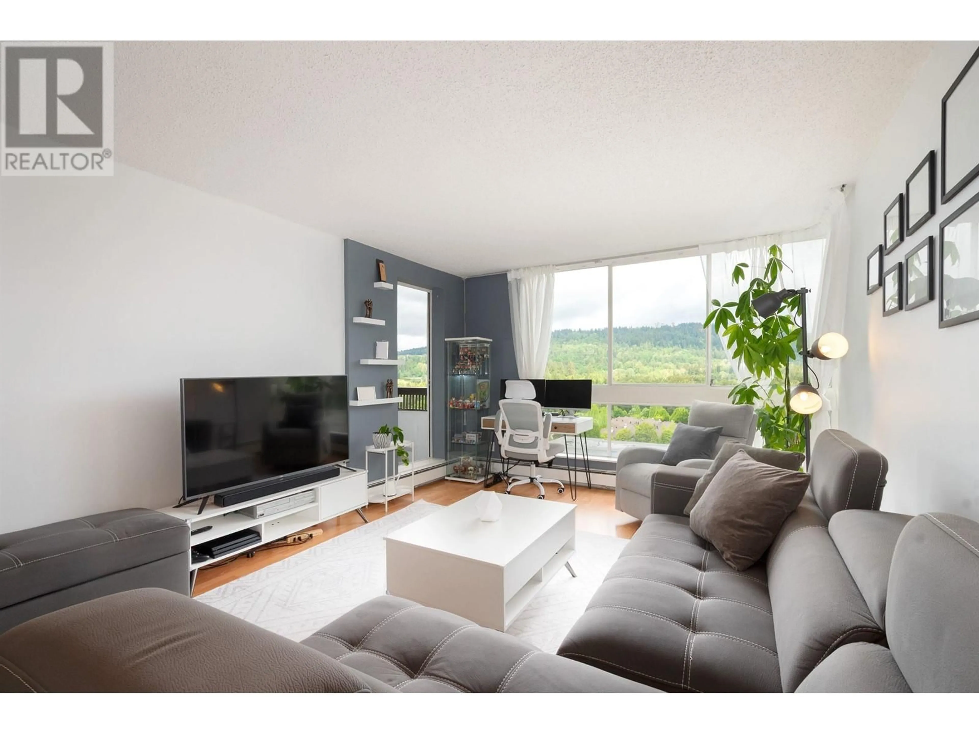 Living room with furniture, wood/laminate floor for 1506 - 9280 SALISH COURT, Burnaby British Columbia V3J7J8