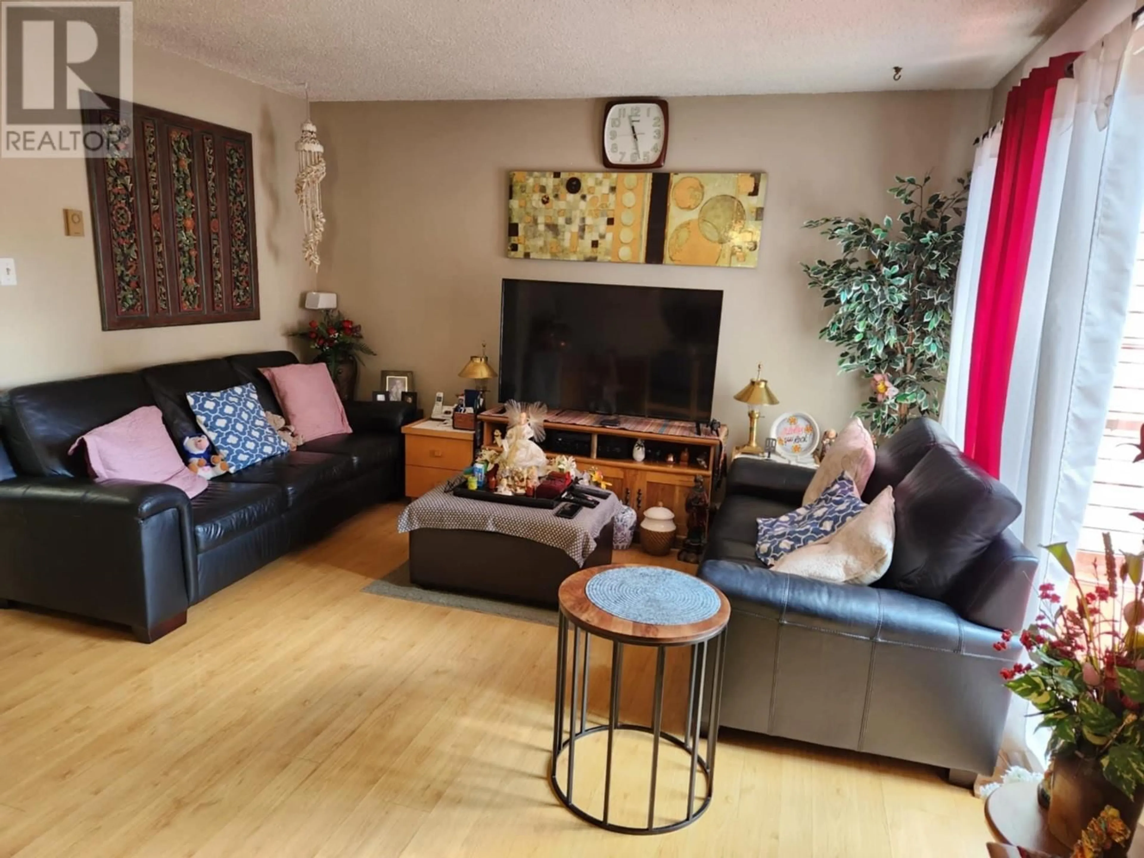 Living room with furniture, wood/laminate floor for 209 - 8160 COLONIAL DRIVE, Richmond British Columbia V7C4T7
