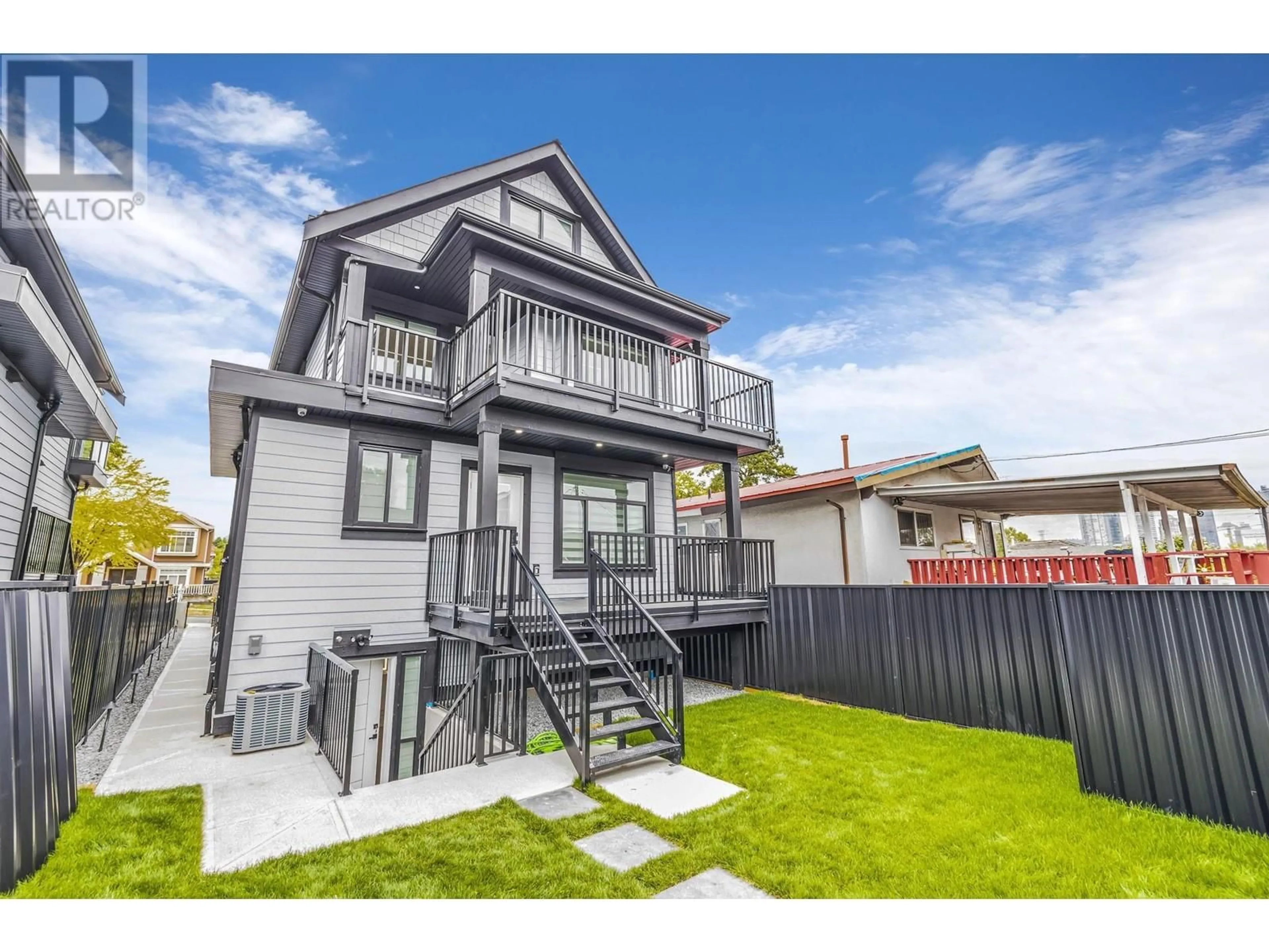 Home with vinyl exterior material, street for 3440 4TH AVENUE, Vancouver British Columbia V5M1L9