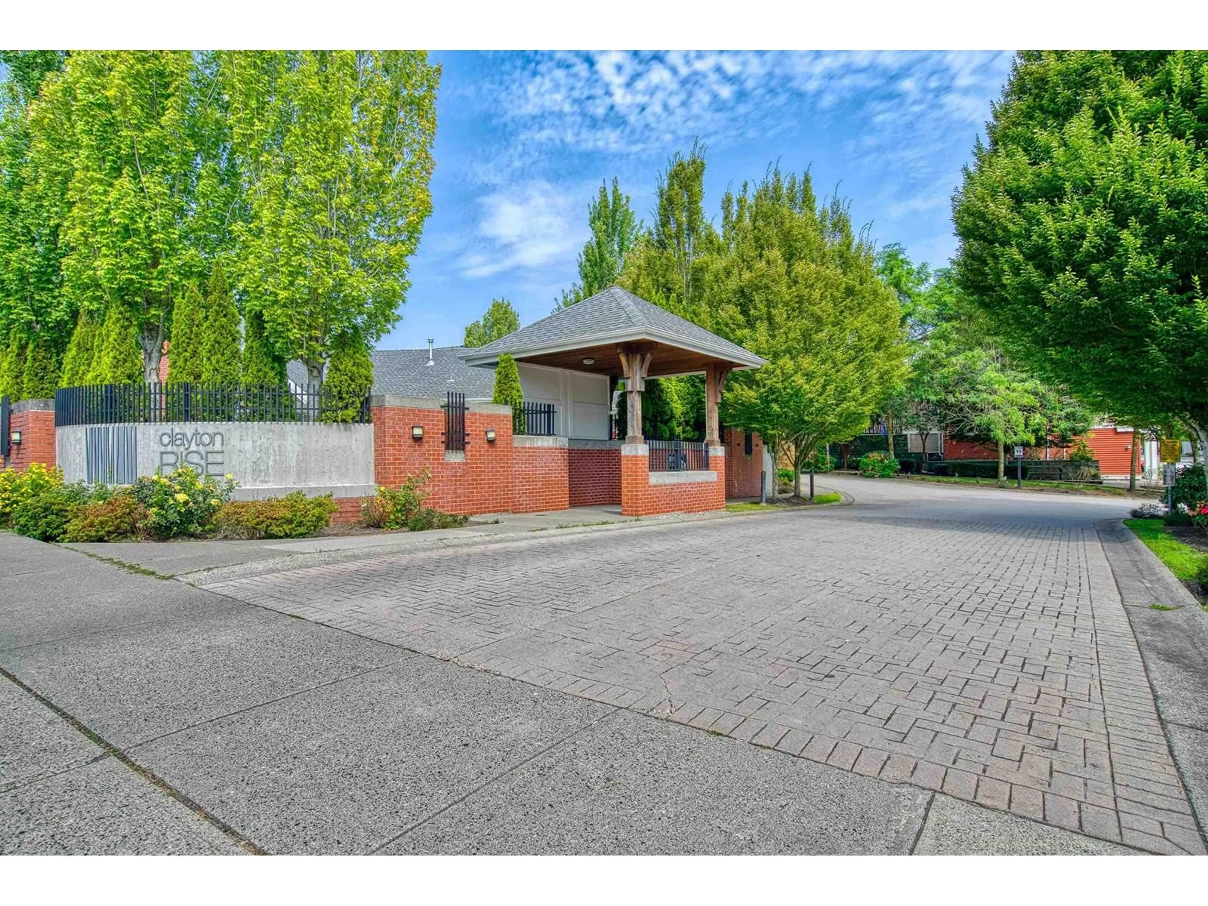 A pic from outside/outdoor area/front of a property/back of a property/a pic from drone, street for 100 - 19505 68A, Surrey British Columbia V4N6K3