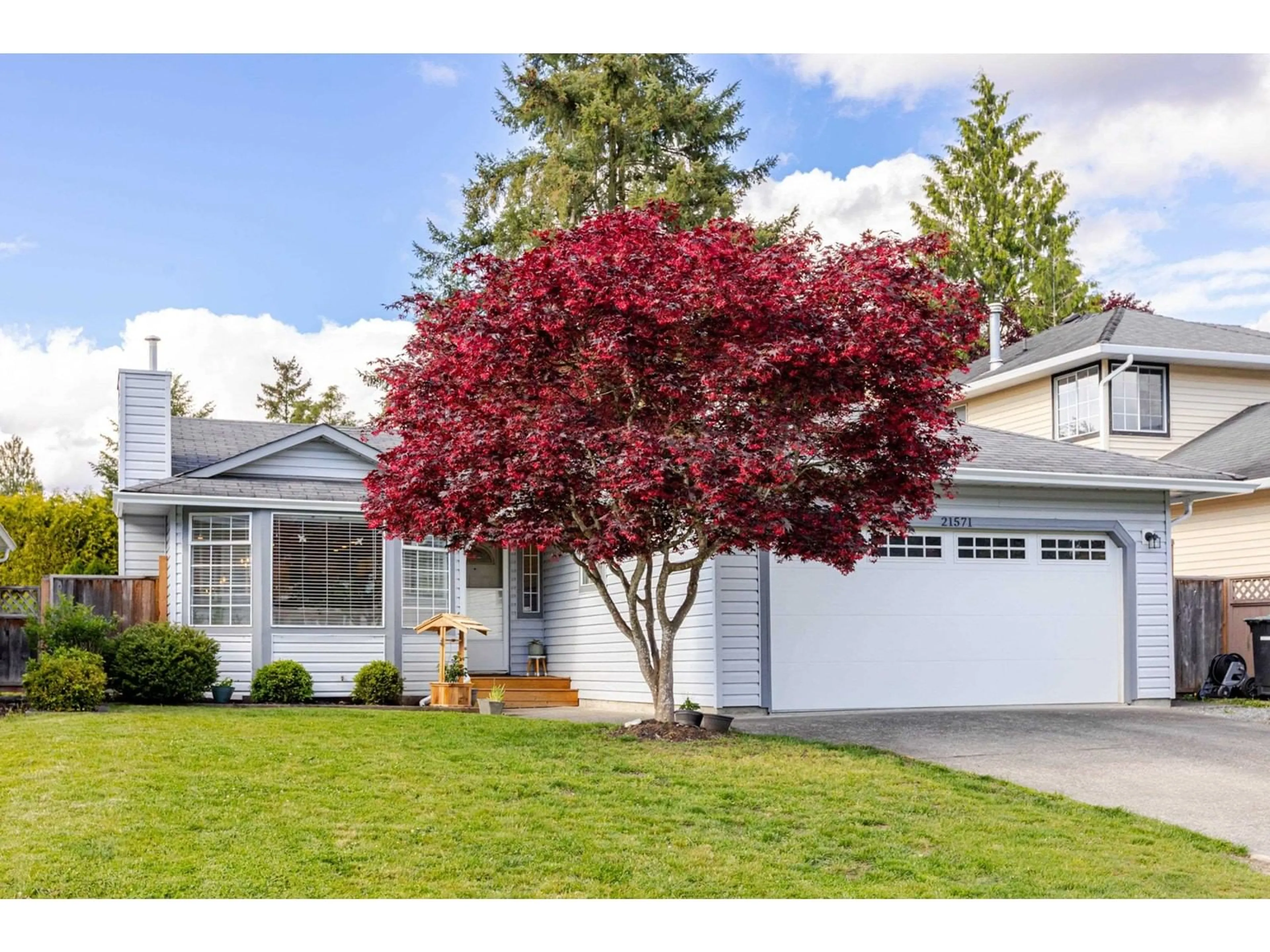 Home with vinyl exterior material, street for 21571 93B, Langley British Columbia V1M2A3