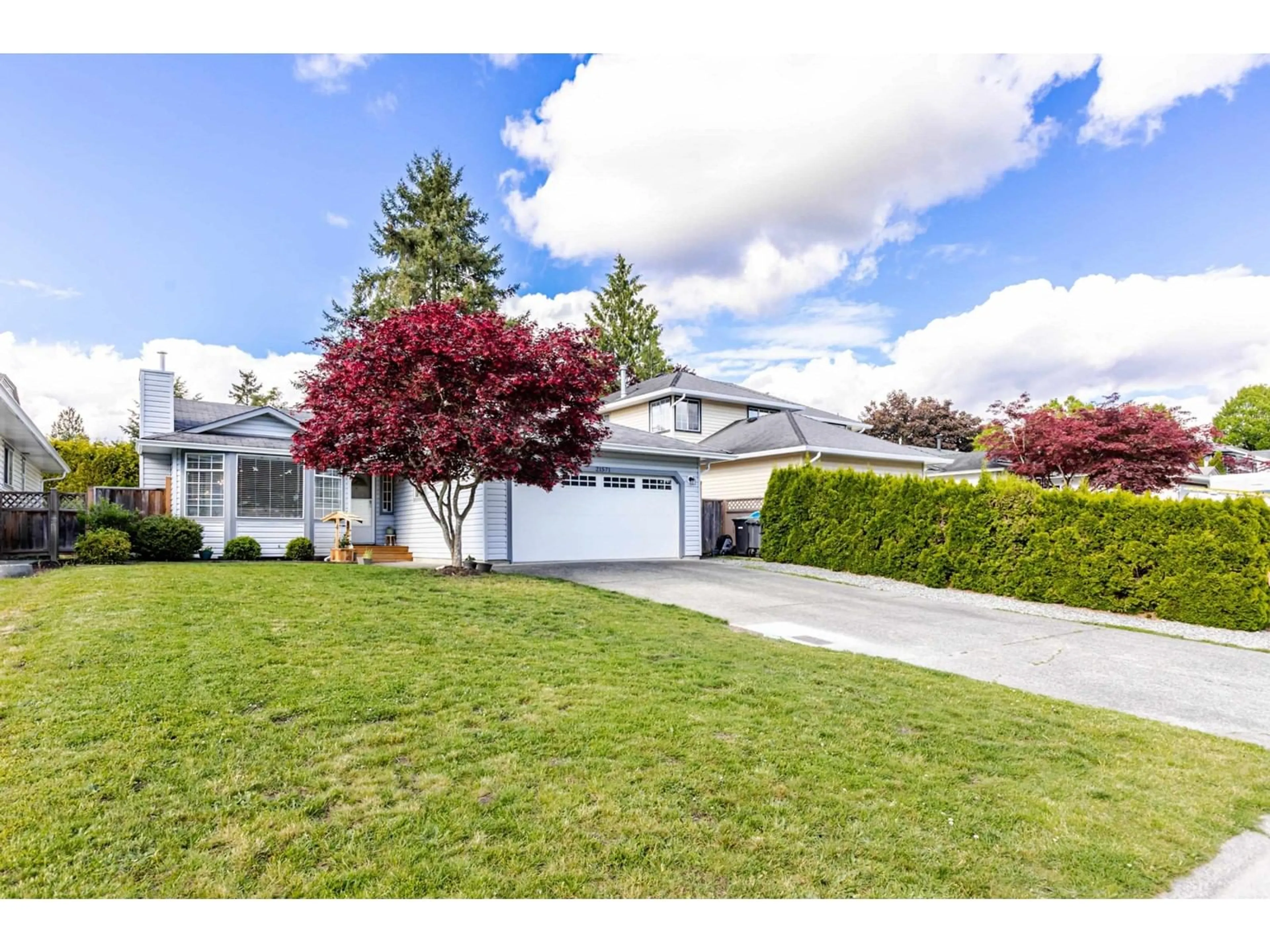 Home with vinyl exterior material, street for 21571 93B, Langley British Columbia V1M2A3