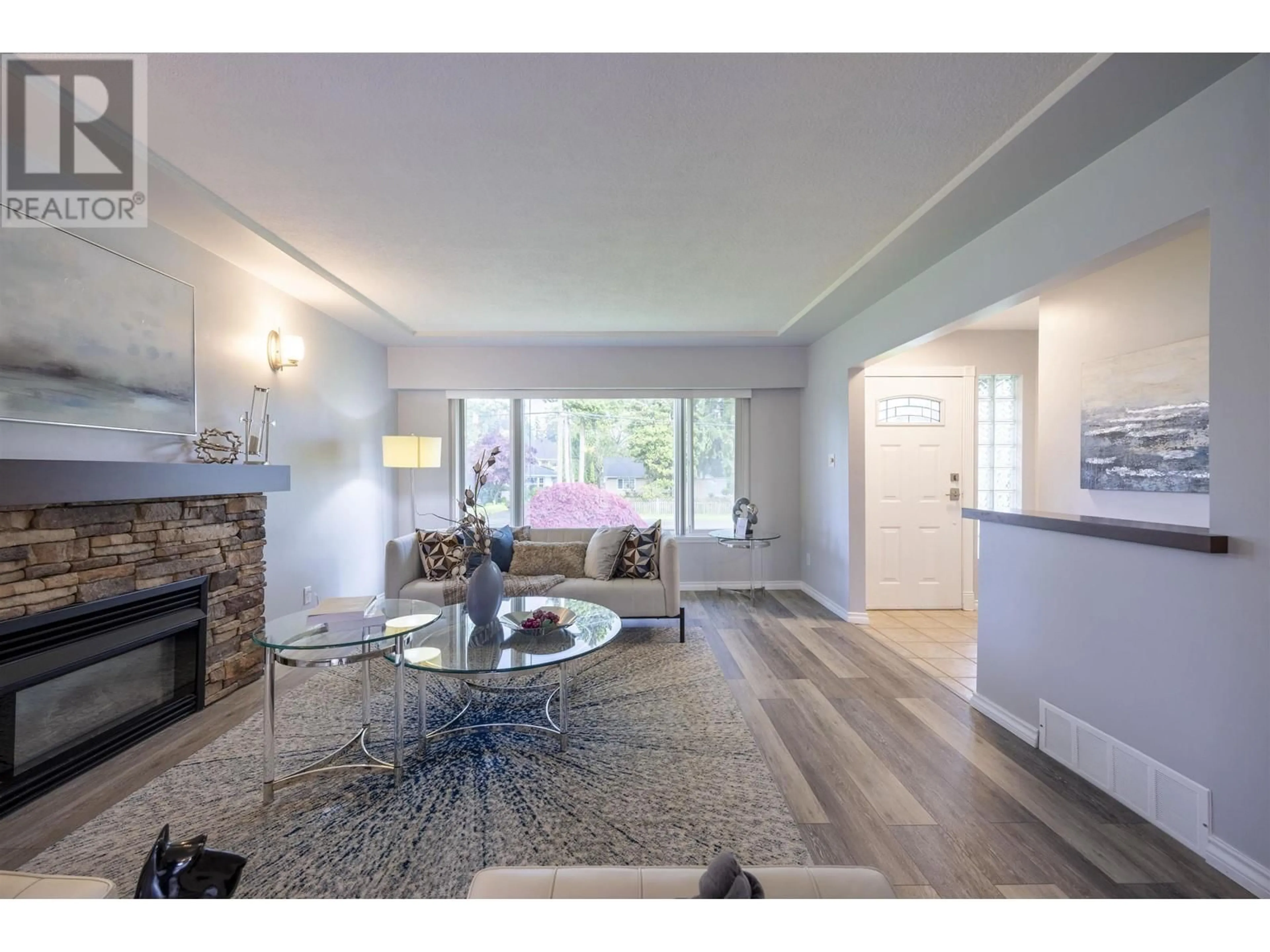 Living room with furniture, wood/laminate floor for 1009 FOSTER AVENUE, Coquitlam British Columbia V3J2M4