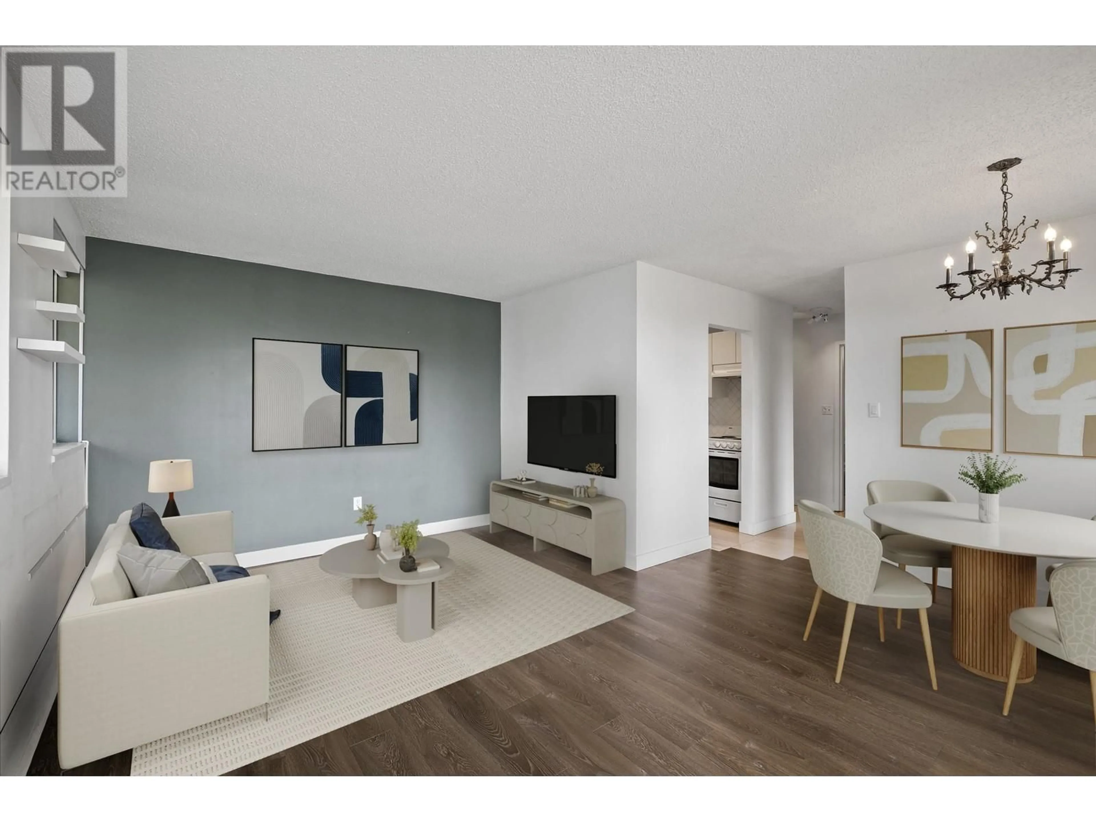 Living room with furniture, wood/laminate floor for 306 - 150 15TH STREET, North Vancouver British Columbia V7L4N9
