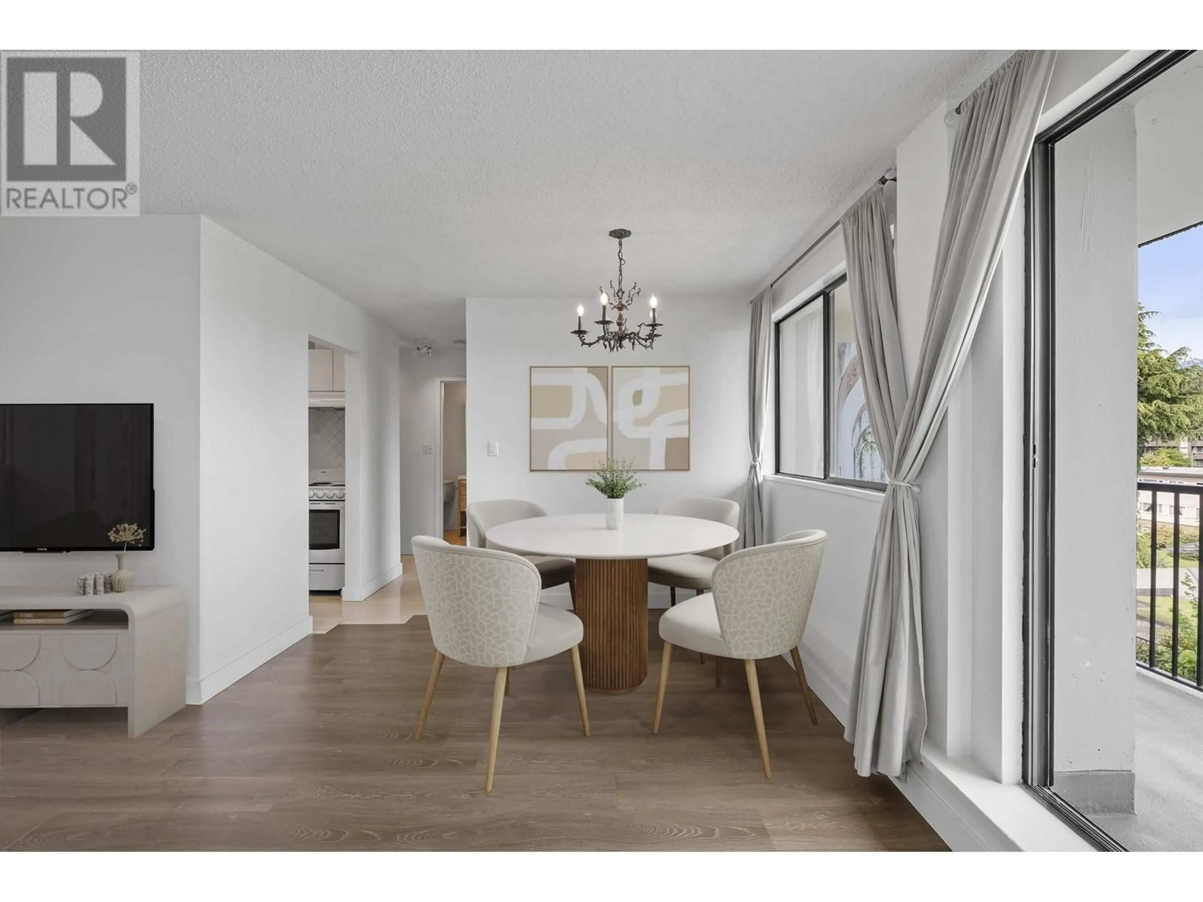 Dining room, wood/laminate floor for 306 - 150 15TH STREET, North Vancouver British Columbia V7L4N9