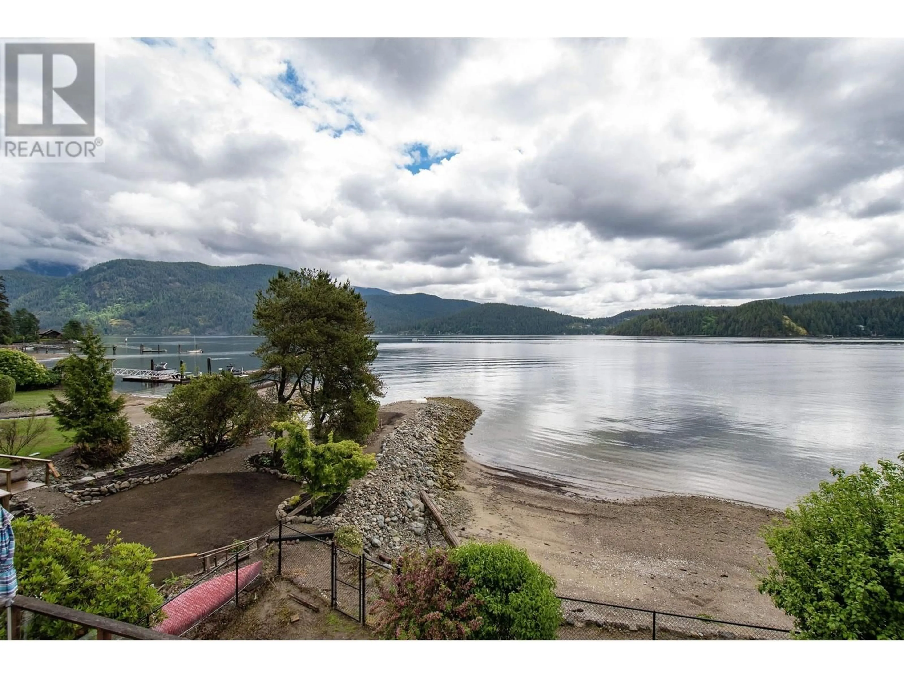 A pic from outside/outdoor area/front of a property/back of a property/a pic from drone, water/lake/river/ocean view for 5293 INDIAN RIVER DRIVE, North Vancouver British Columbia V7G2T6