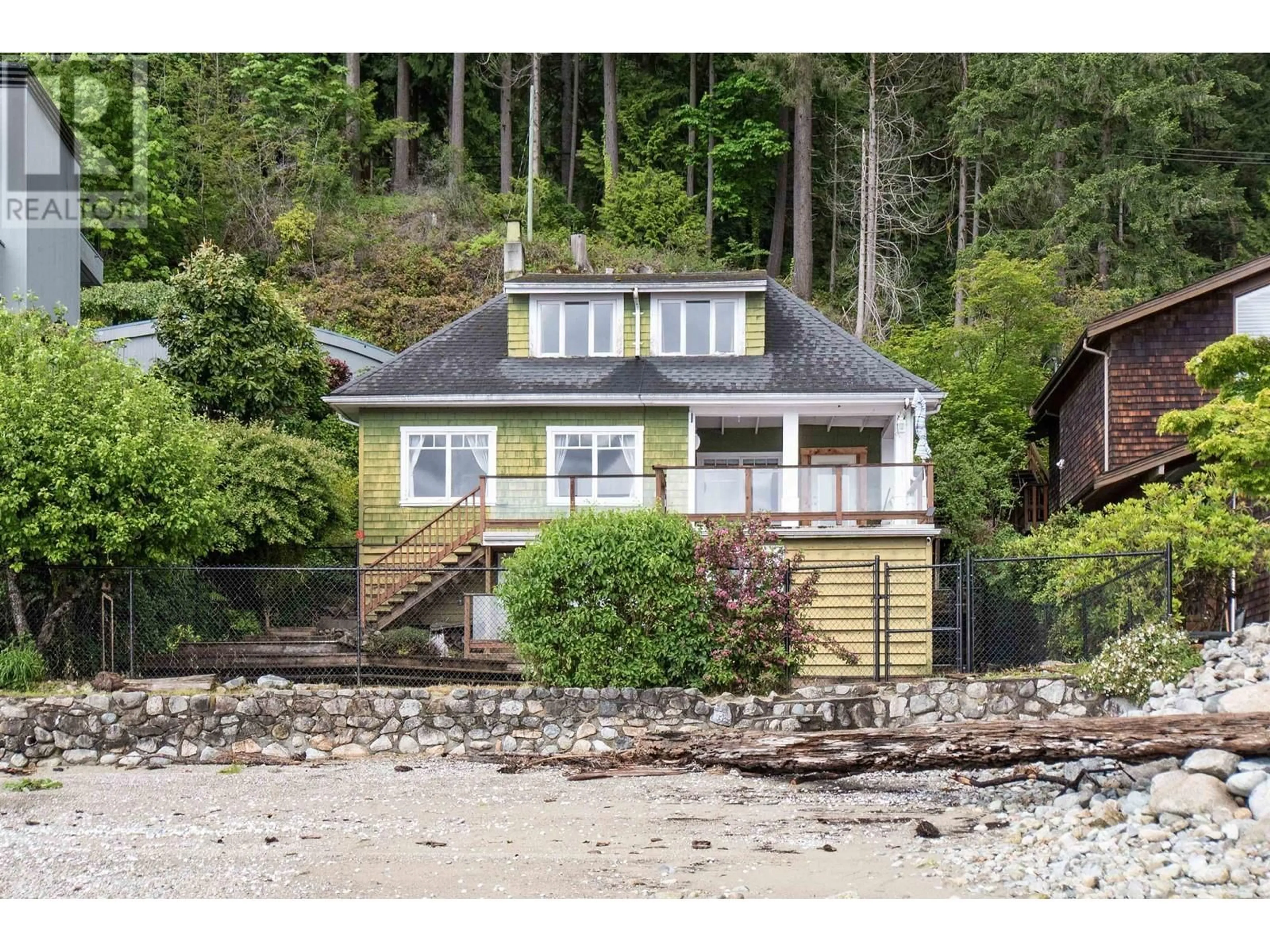 A pic from outside/outdoor area/front of a property/back of a property/a pic from drone, water/lake/river/ocean view for 5293 INDIAN RIVER DRIVE, North Vancouver British Columbia V7G2T6