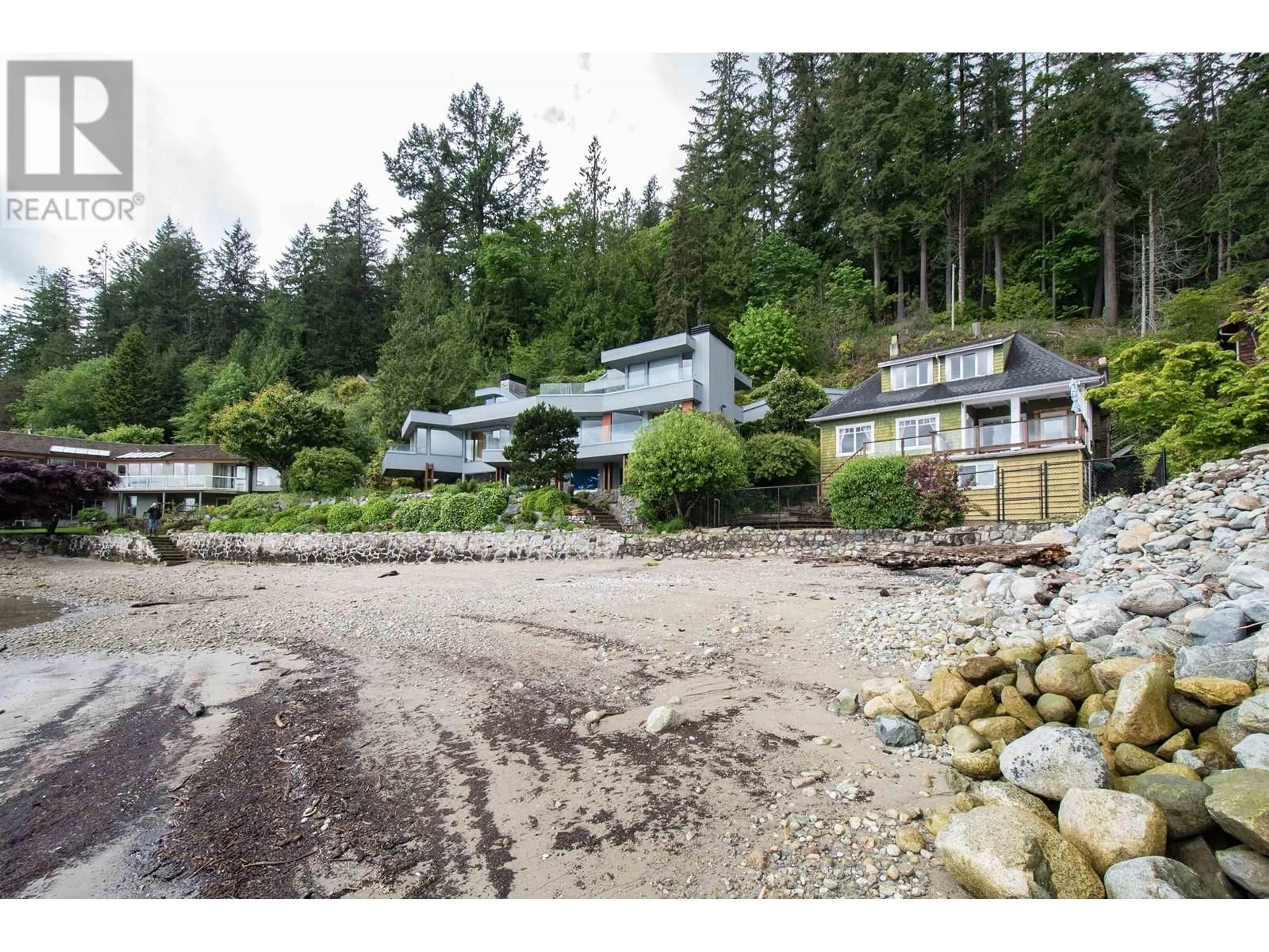 A pic from outside/outdoor area/front of a property/back of a property/a pic from drone, water/lake/river/ocean view for 5293 INDIAN RIVER DRIVE, North Vancouver British Columbia V7G2T6