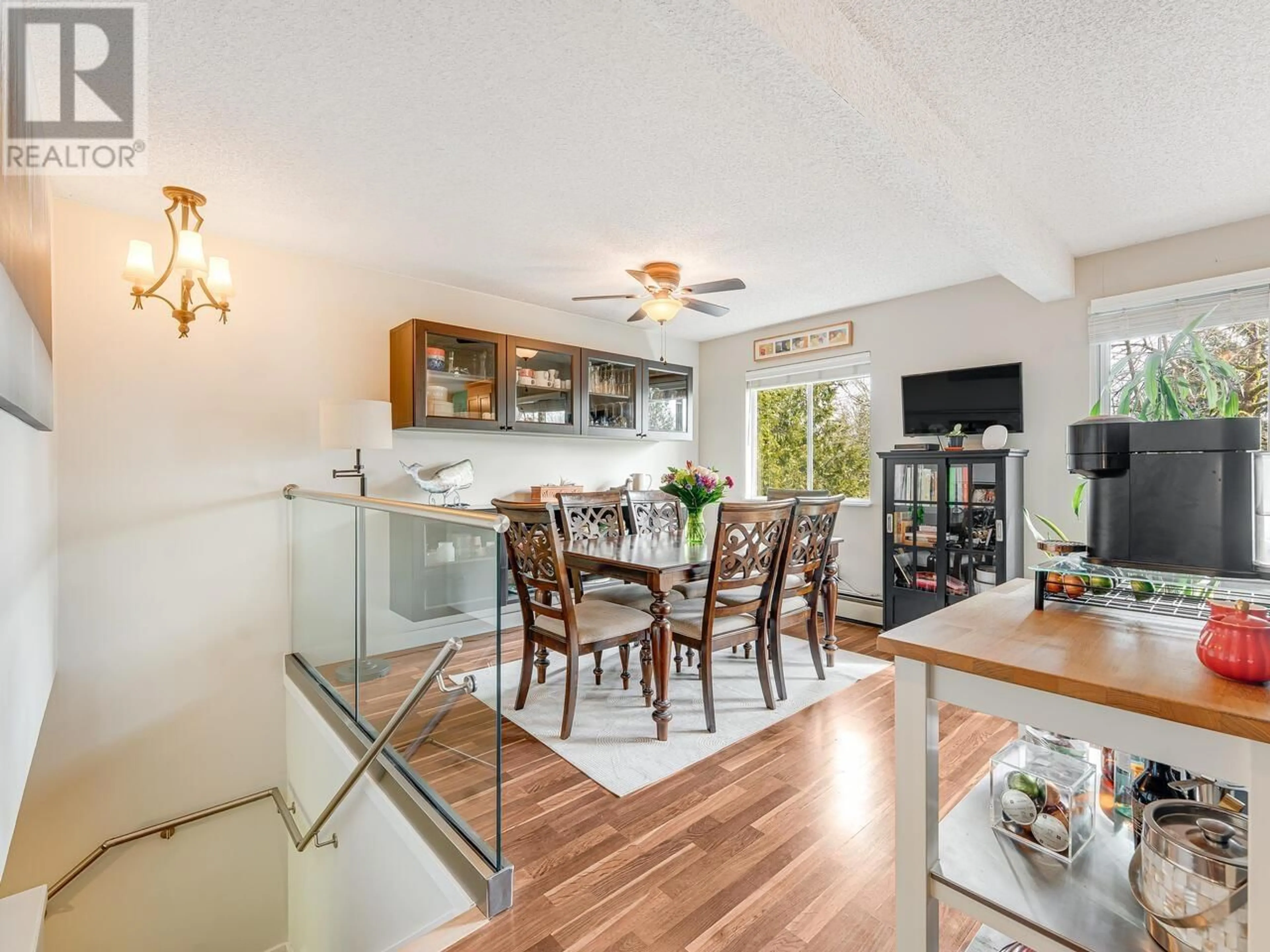 Open concept kitchen, wood/laminate floor for 68 - 9000 ASH GROVE CRESCENT, Burnaby British Columbia V5A4M6