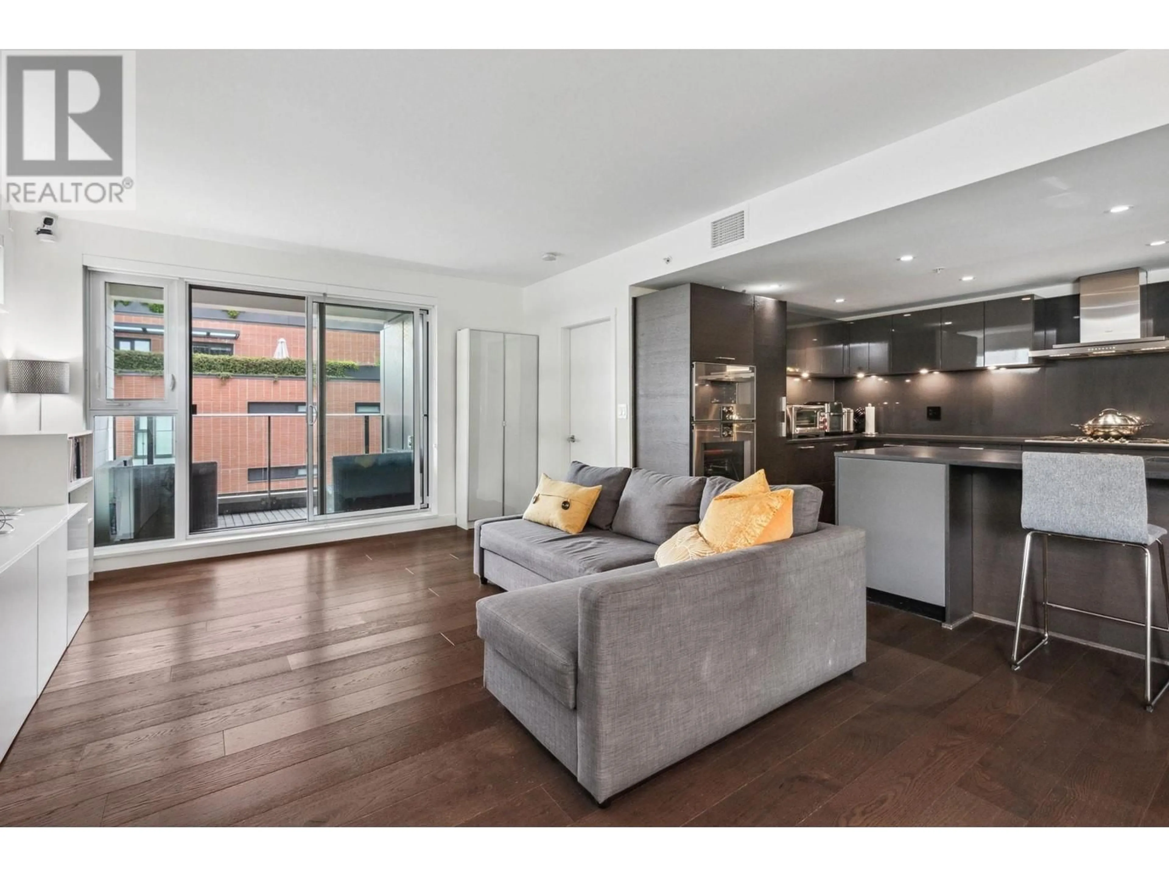 Living room with furniture, unknown for 611 - 7228 ADERA STREET, Vancouver British Columbia V6P0H7