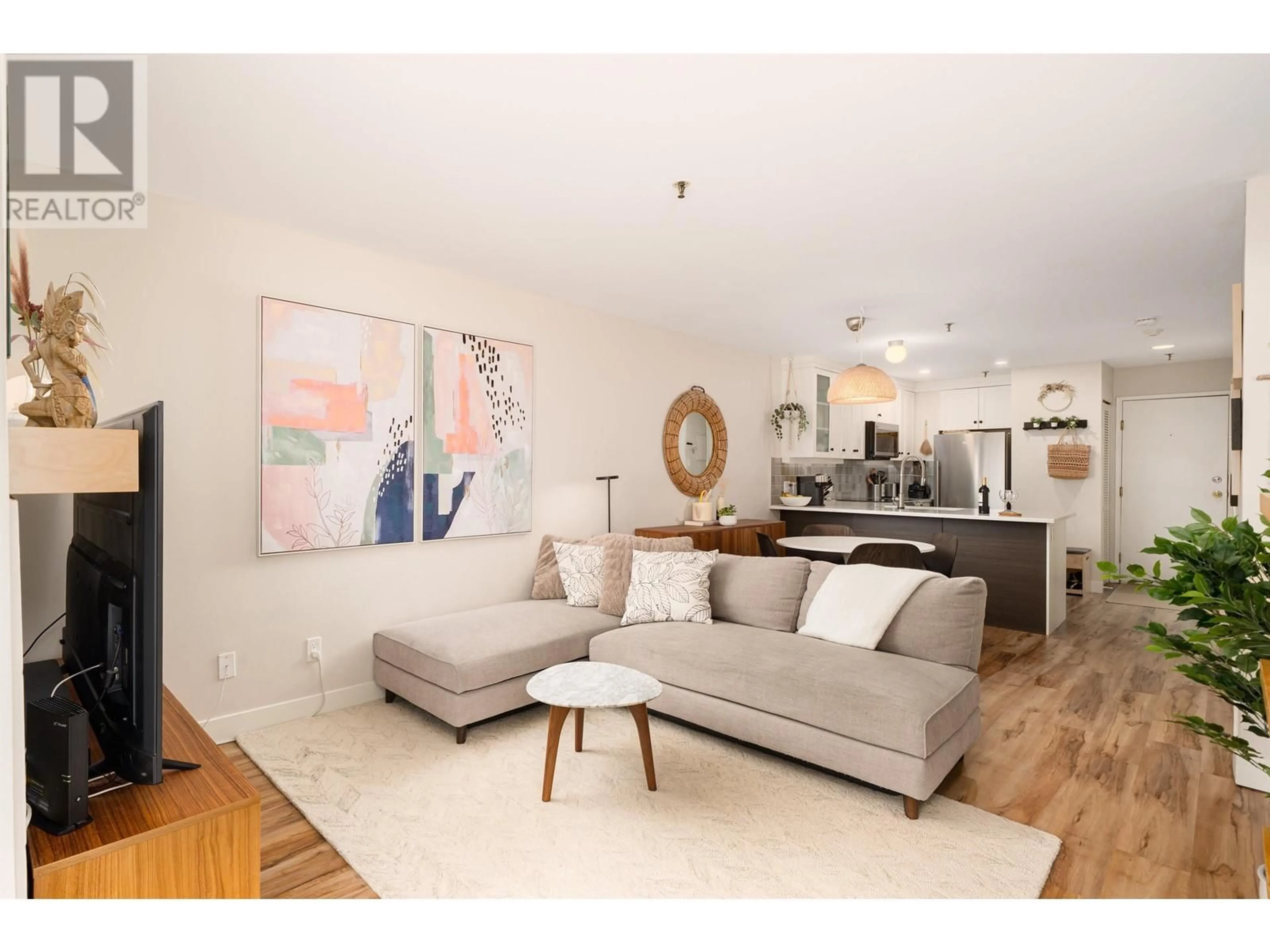 Living room with furniture, wood/laminate floor for 302 - 2333 ETON STREET, Vancouver British Columbia V5L1E2