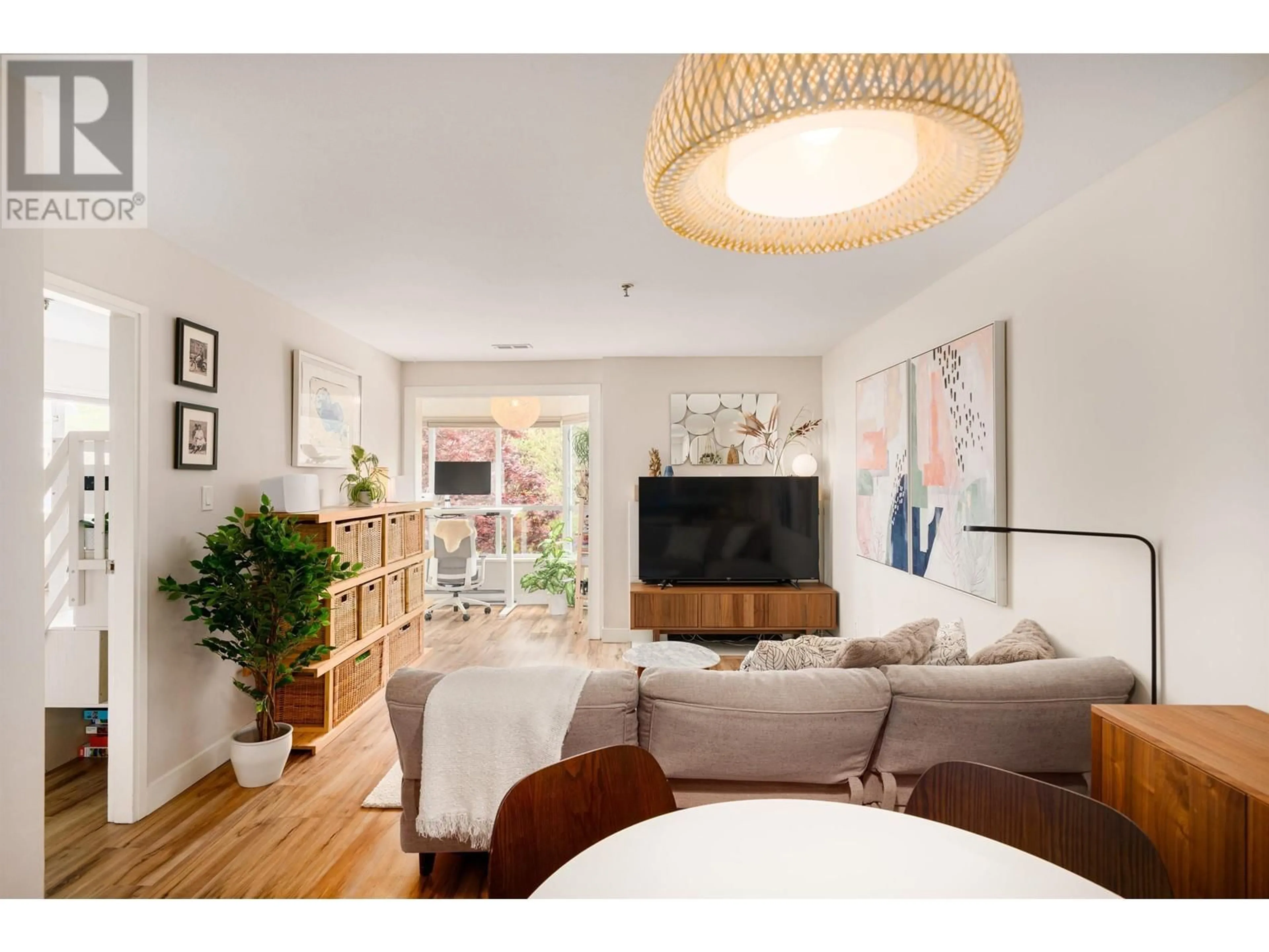 Living room with furniture, wood/laminate floor for 302 - 2333 ETON STREET, Vancouver British Columbia V5L1E2