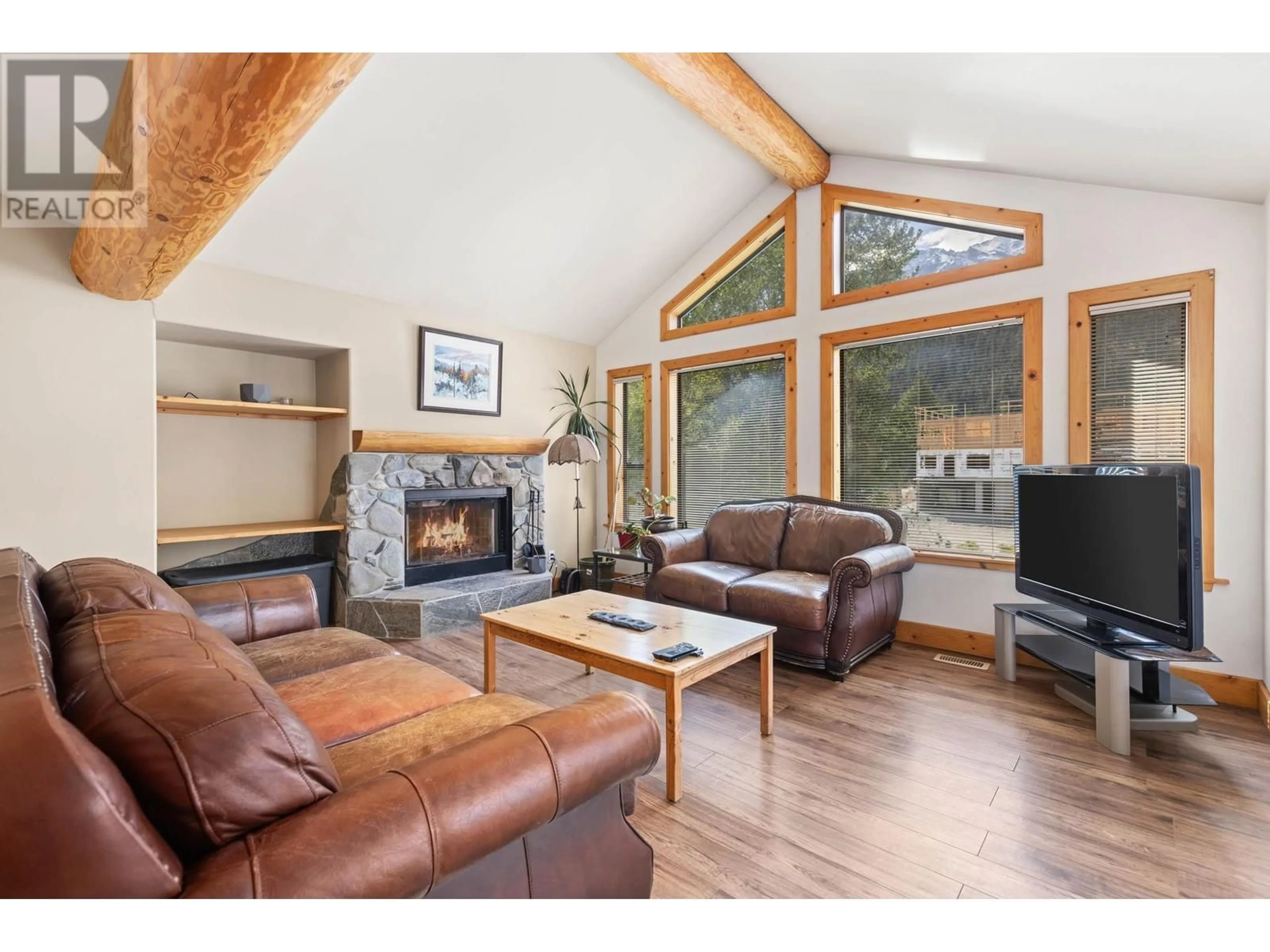 Living room with furniture, wood/laminate floor for 1488 BALSAM STREET, Pemberton British Columbia V0N2L0