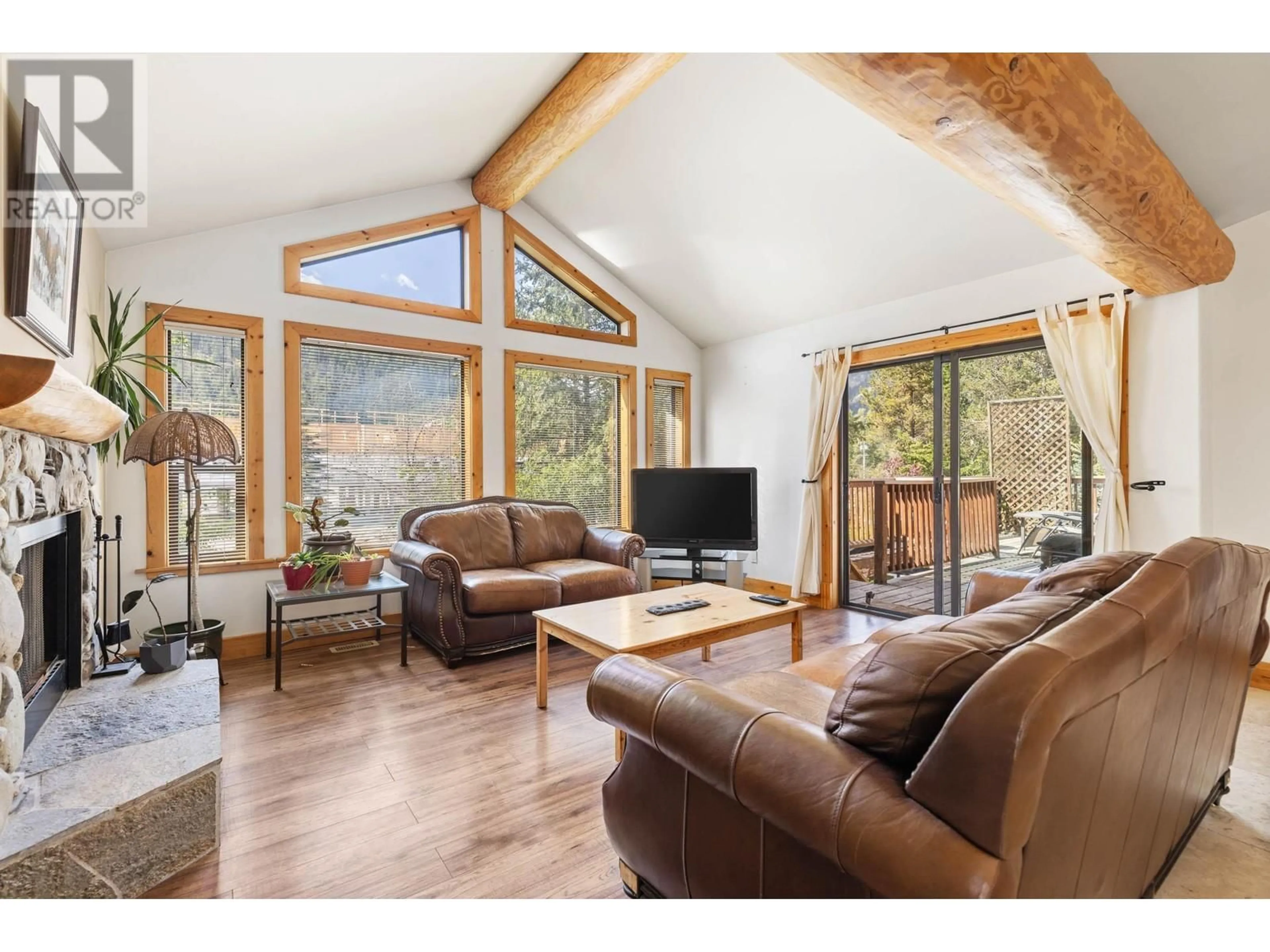 Living room with furniture, wood/laminate floor for 1488 BALSAM STREET, Pemberton British Columbia V0N2L0