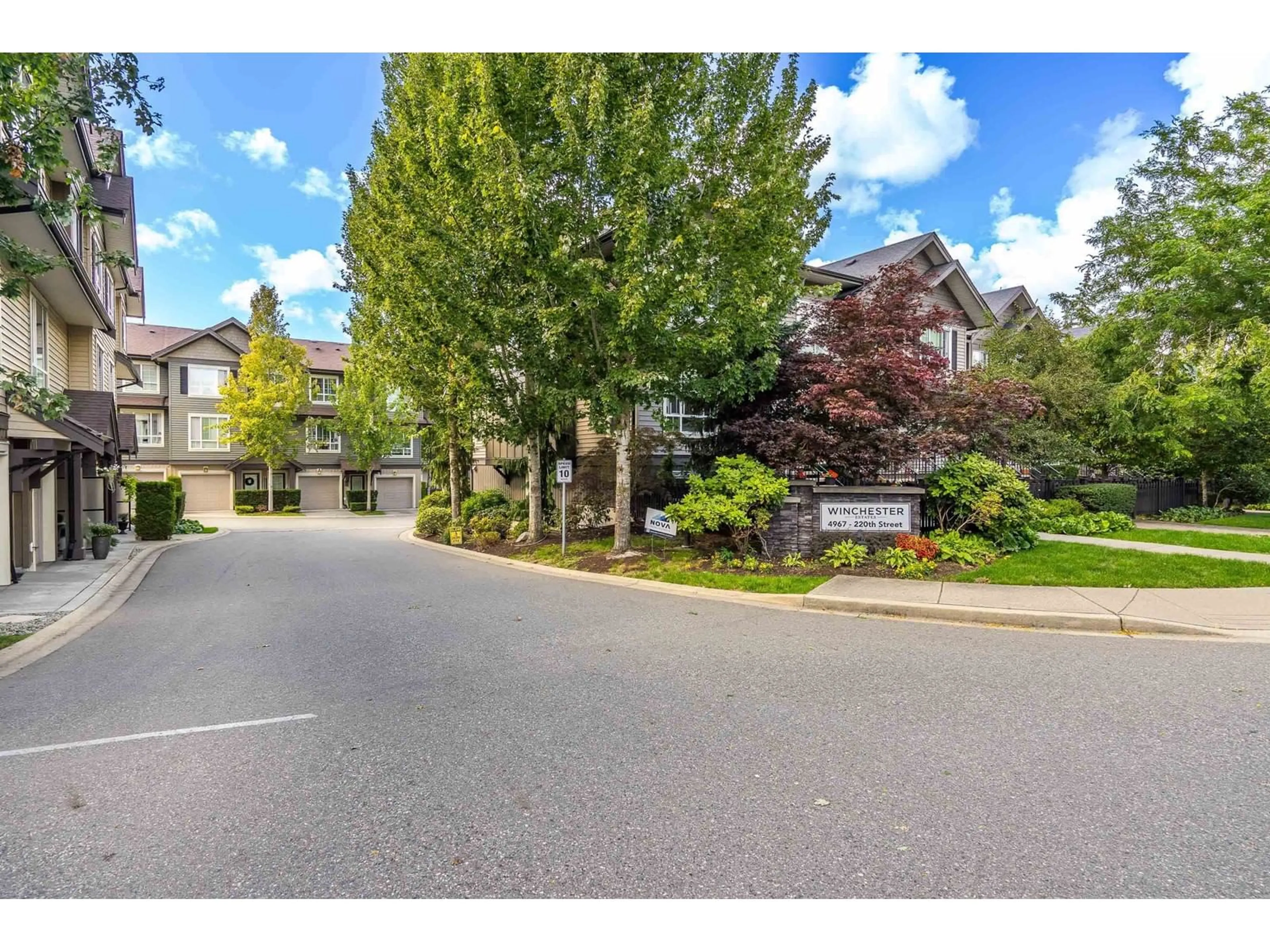 A pic from outside/outdoor area/front of a property/back of a property/a pic from drone, street for 44 - 4967 220, Langley British Columbia V3A0G3