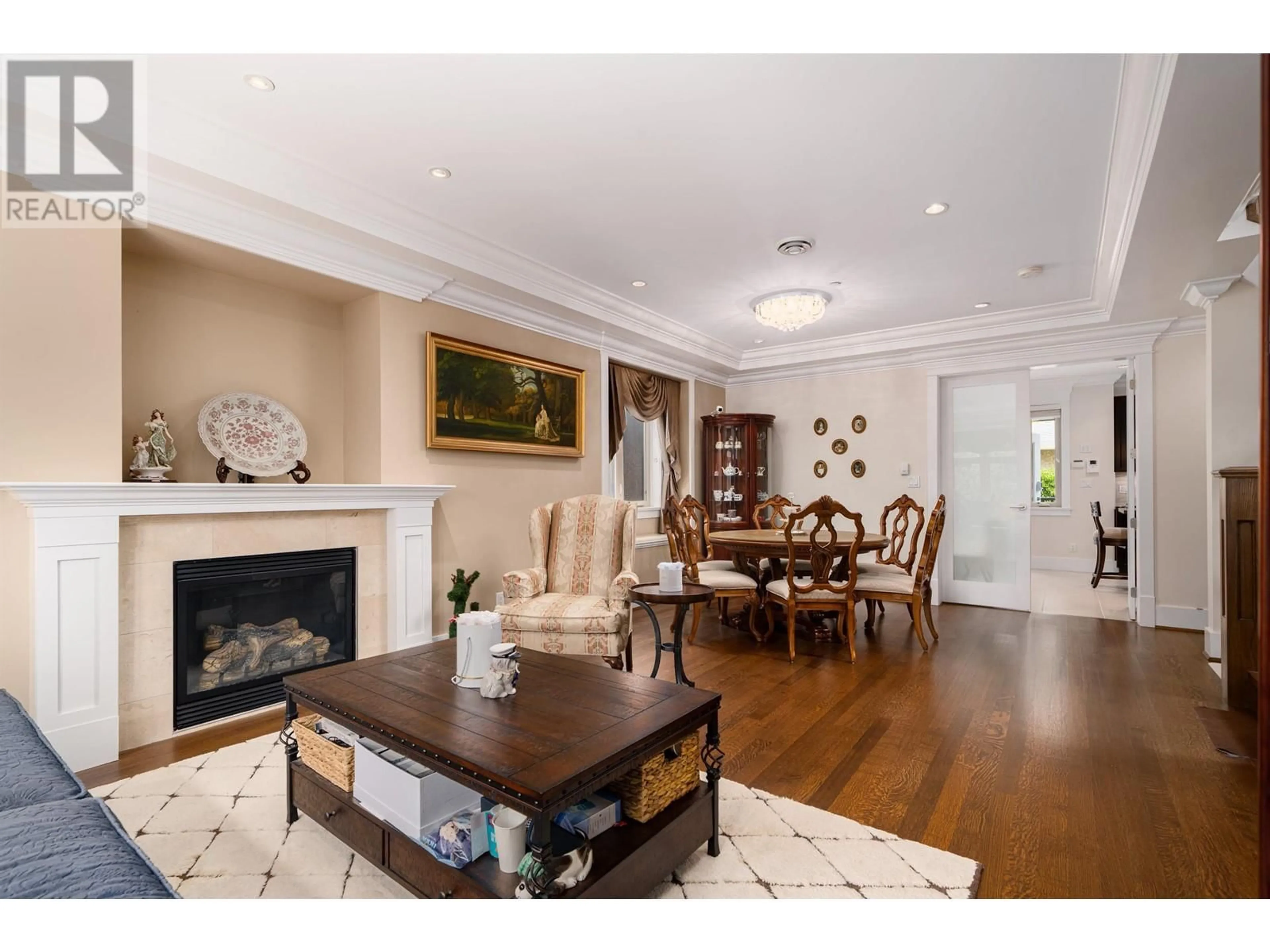Living room with furniture, wood/laminate floor for 1683 64TH AVENUE, Vancouver British Columbia V6P2P2