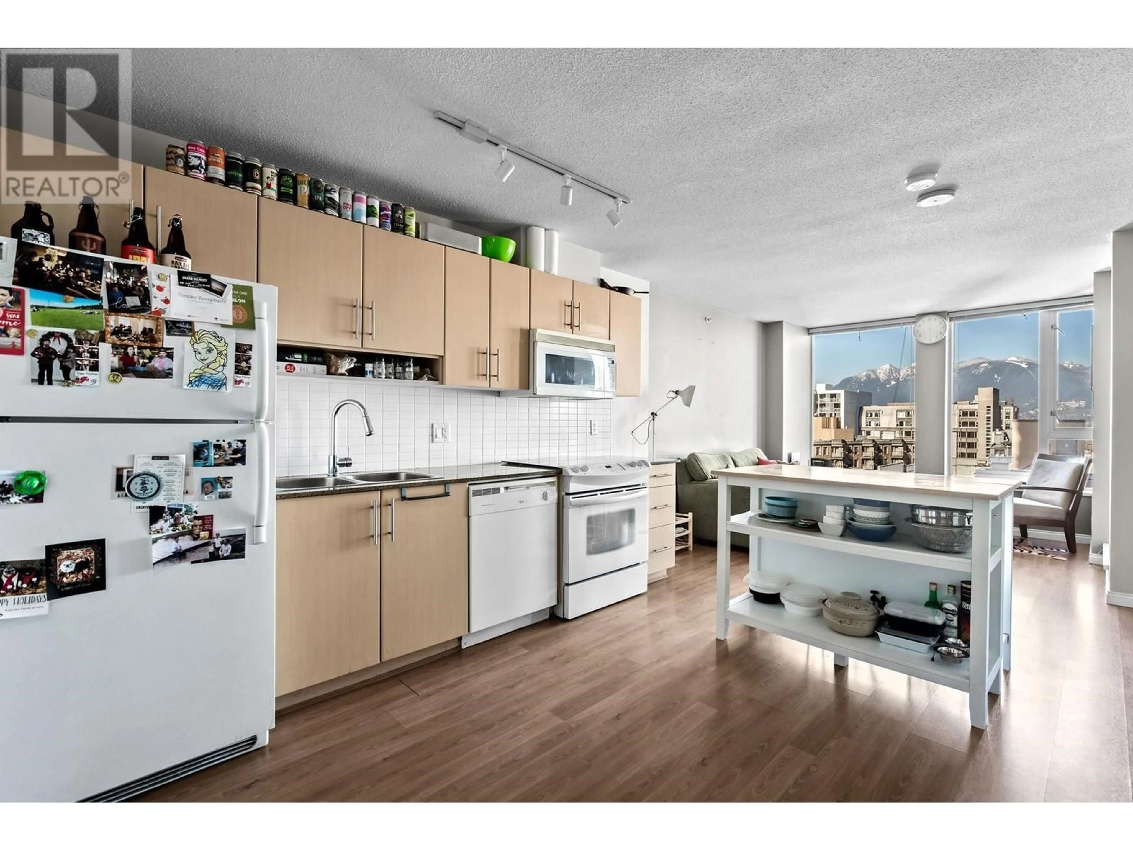 Open concept kitchen, wood/laminate floor for 1005 - 550 TAYLOR STREET, Vancouver British Columbia V6B1R1