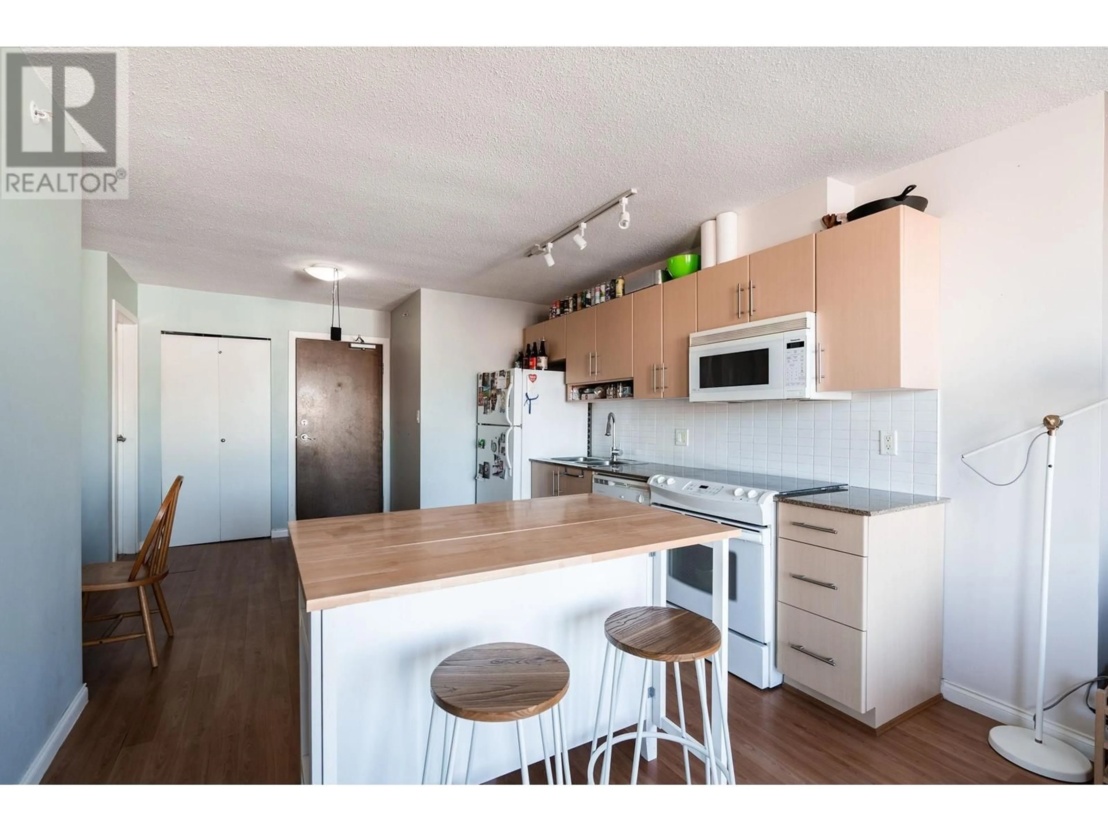 Open concept kitchen, wood/laminate floor for 1005 - 550 TAYLOR STREET, Vancouver British Columbia V6B1R1